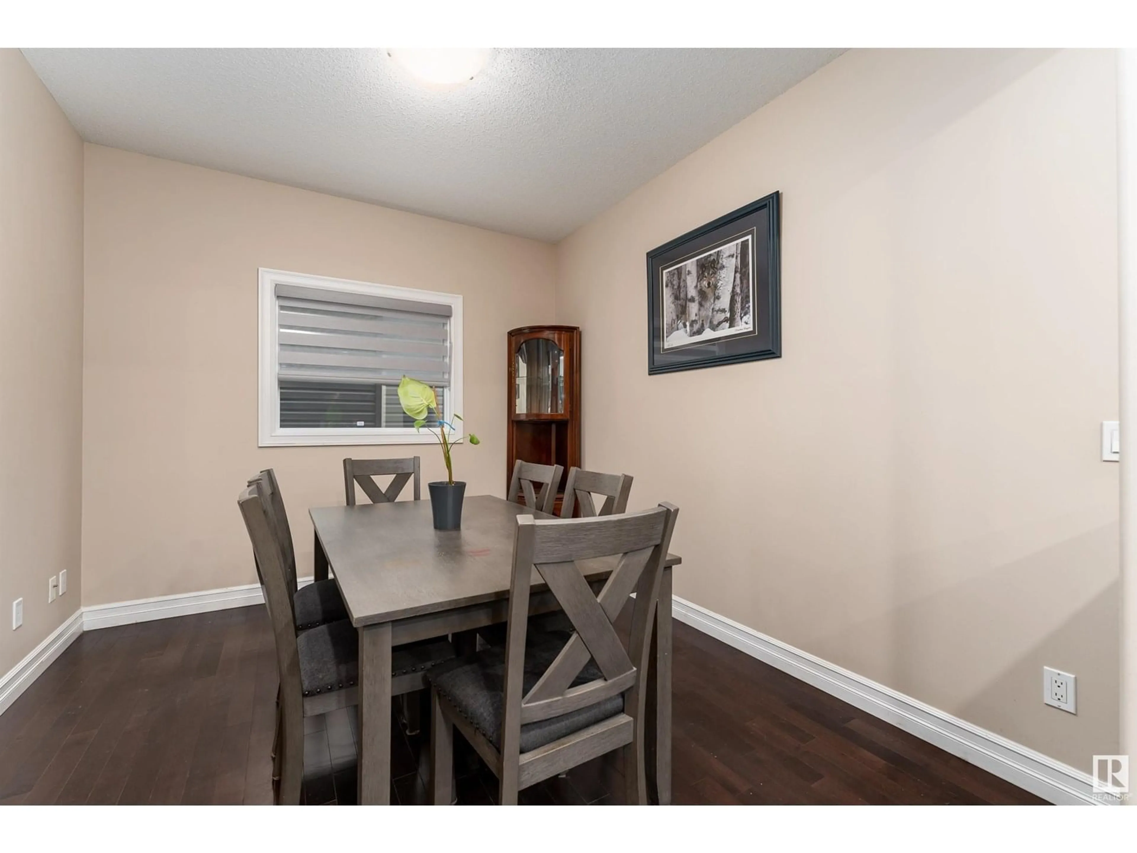 Dining room, wood/laminate floor for 11535 16 AV, Edmonton Alberta T6W0Z9