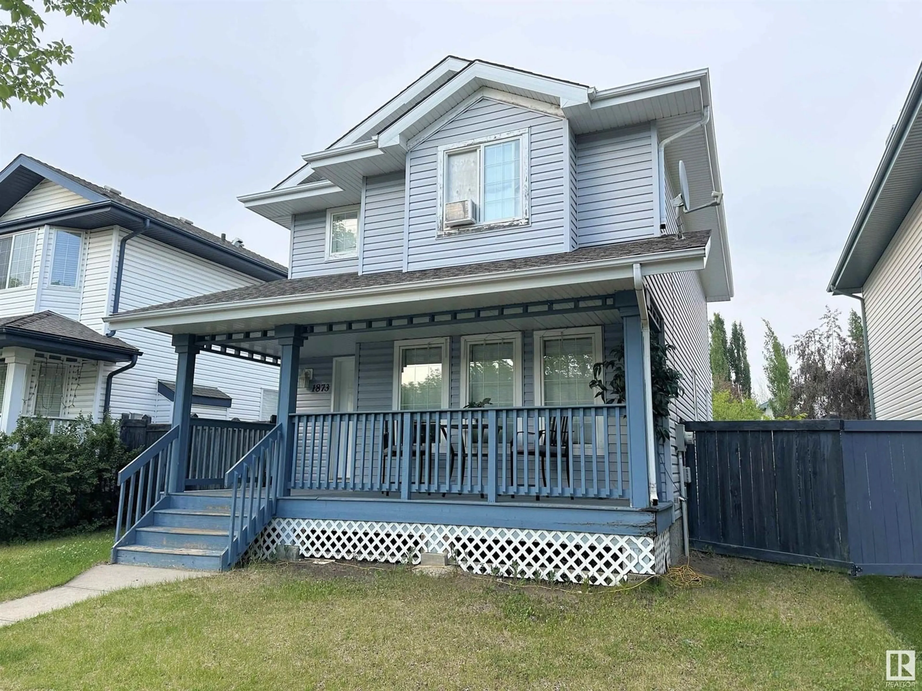 Home with vinyl exterior material, street for 1873 TOWNE CENTRE BV, Edmonton Alberta T6R3J6