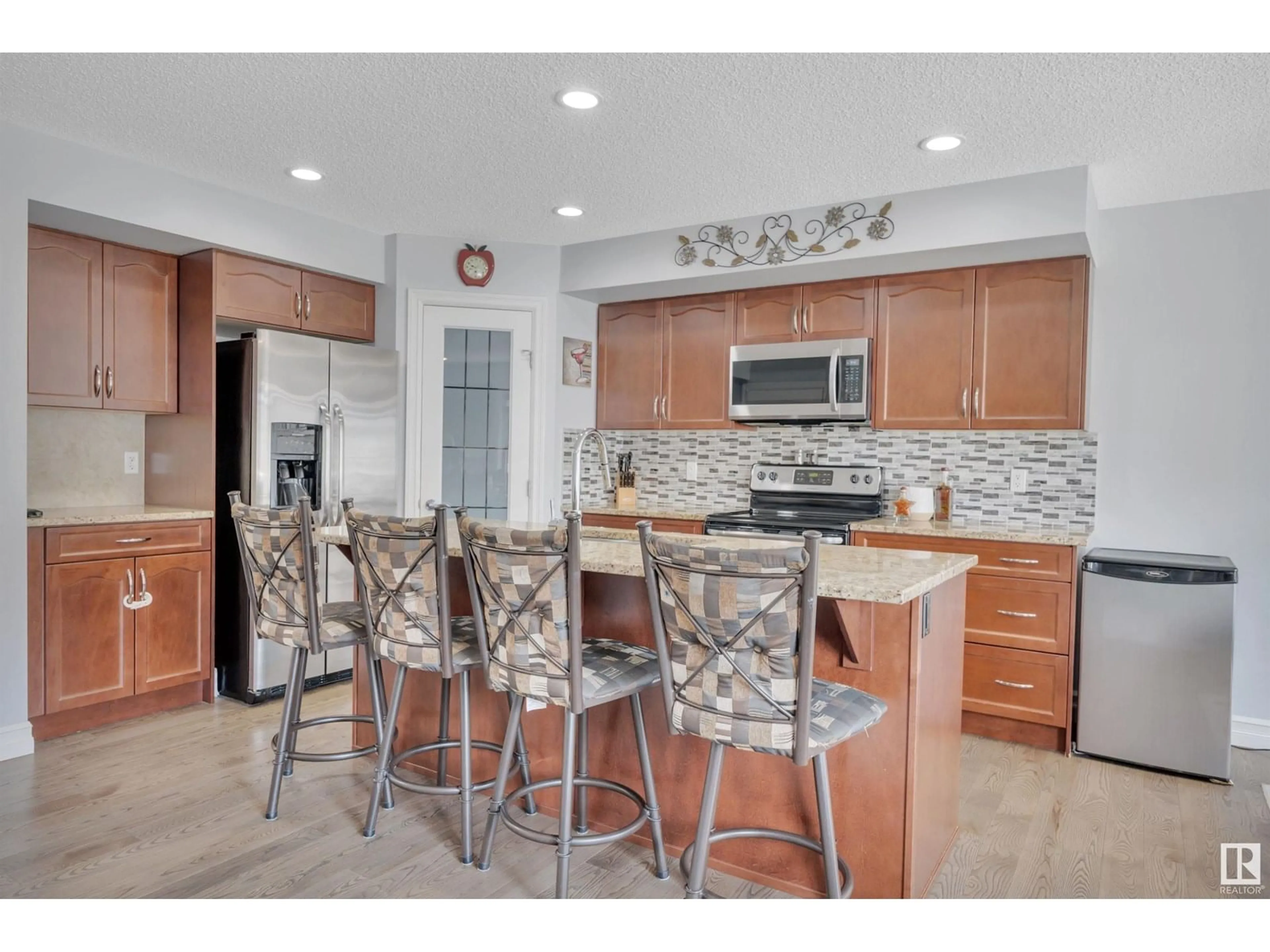 Open concept kitchen, ceramic/tile floor for 5805 64 ST, Beaumont Alberta T4X1Z1