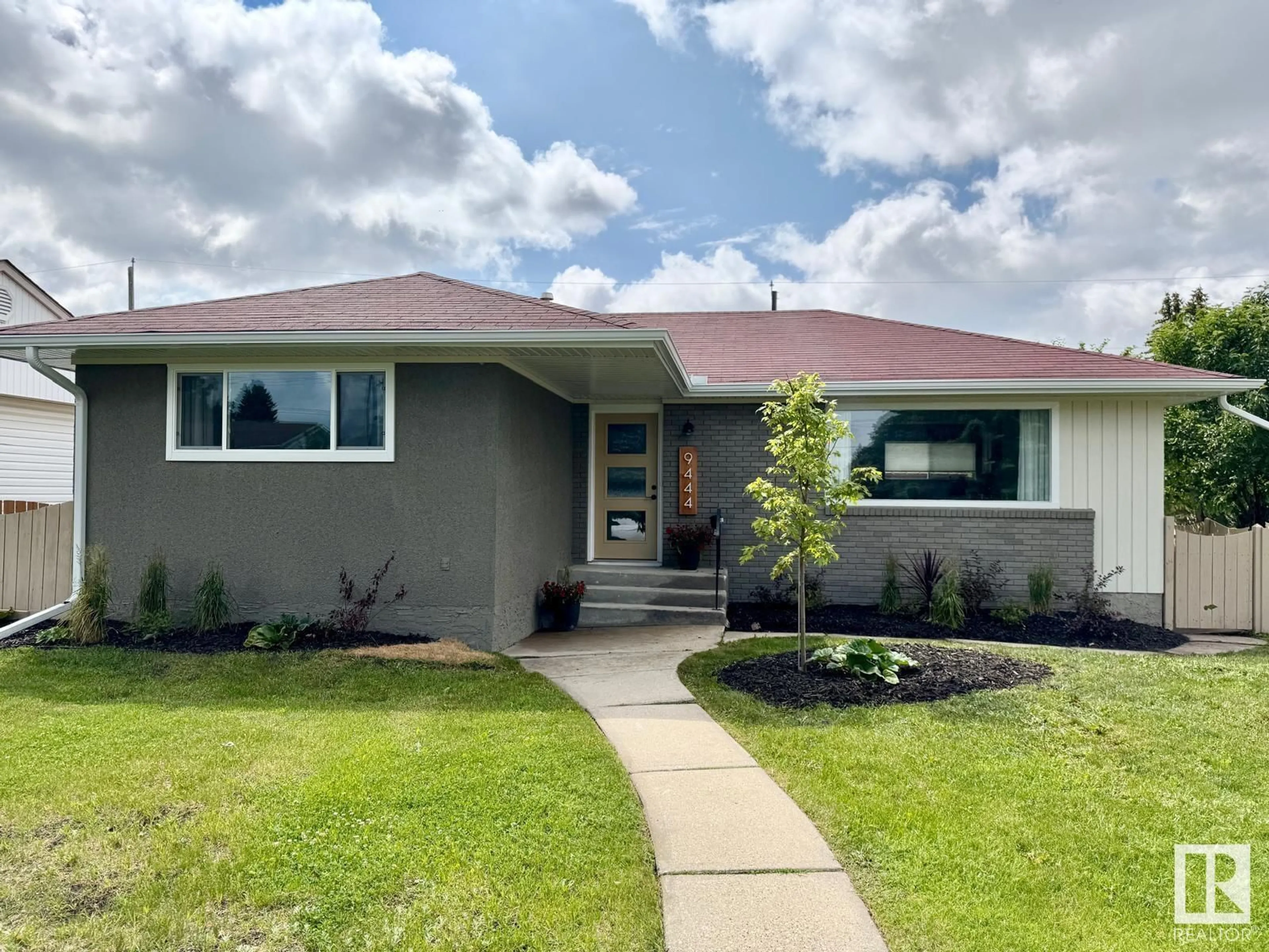 Home with vinyl exterior material, street for 9444 74 ST, Edmonton Alberta T6B2B4