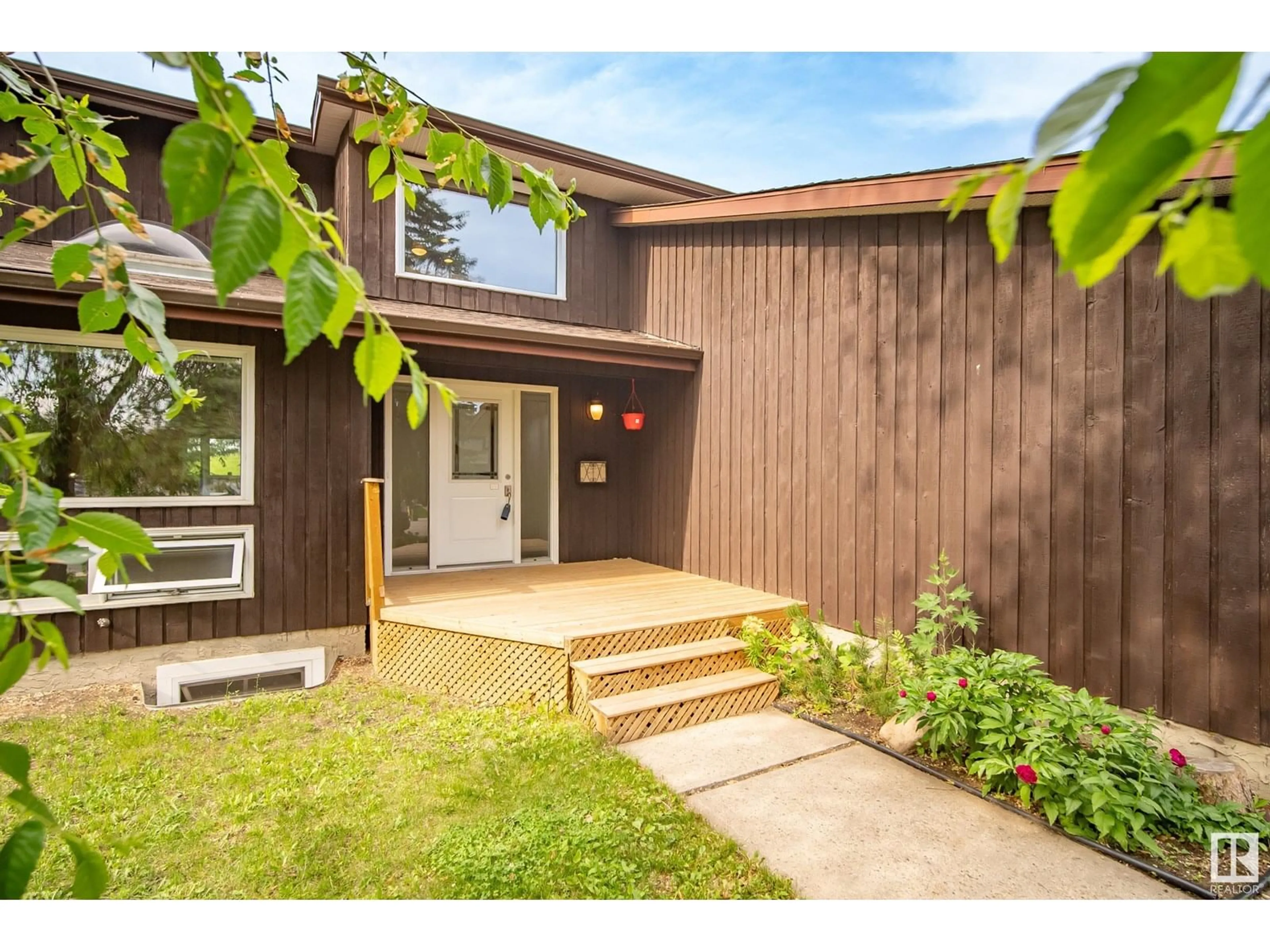 Home with vinyl exterior material, street for 18328 78 AV, Edmonton Alberta T5T2A9