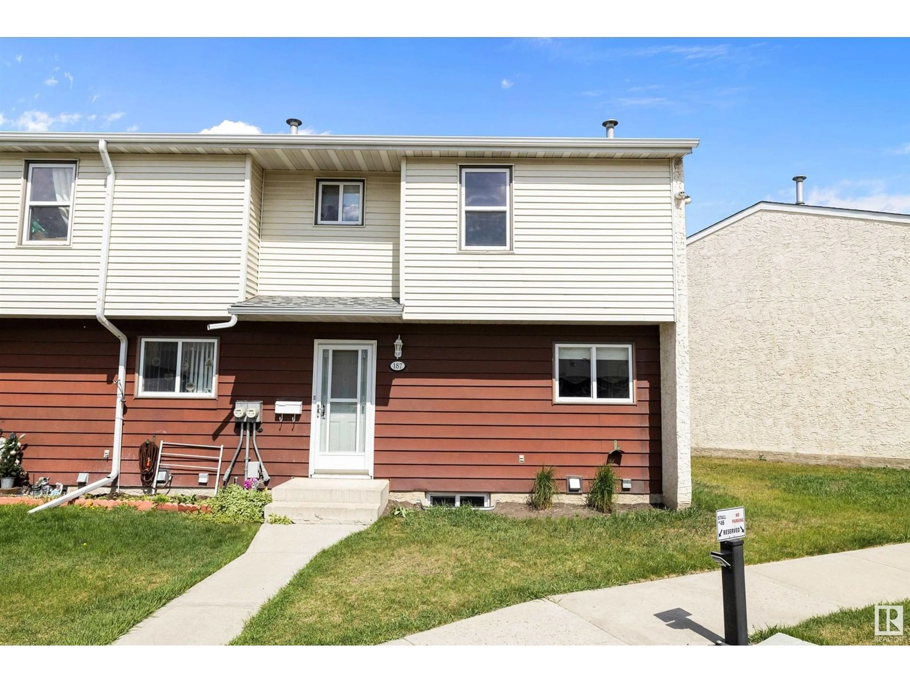 Home with vinyl exterior material, street for 187 HARRISON DR, Edmonton Alberta T5A2X5