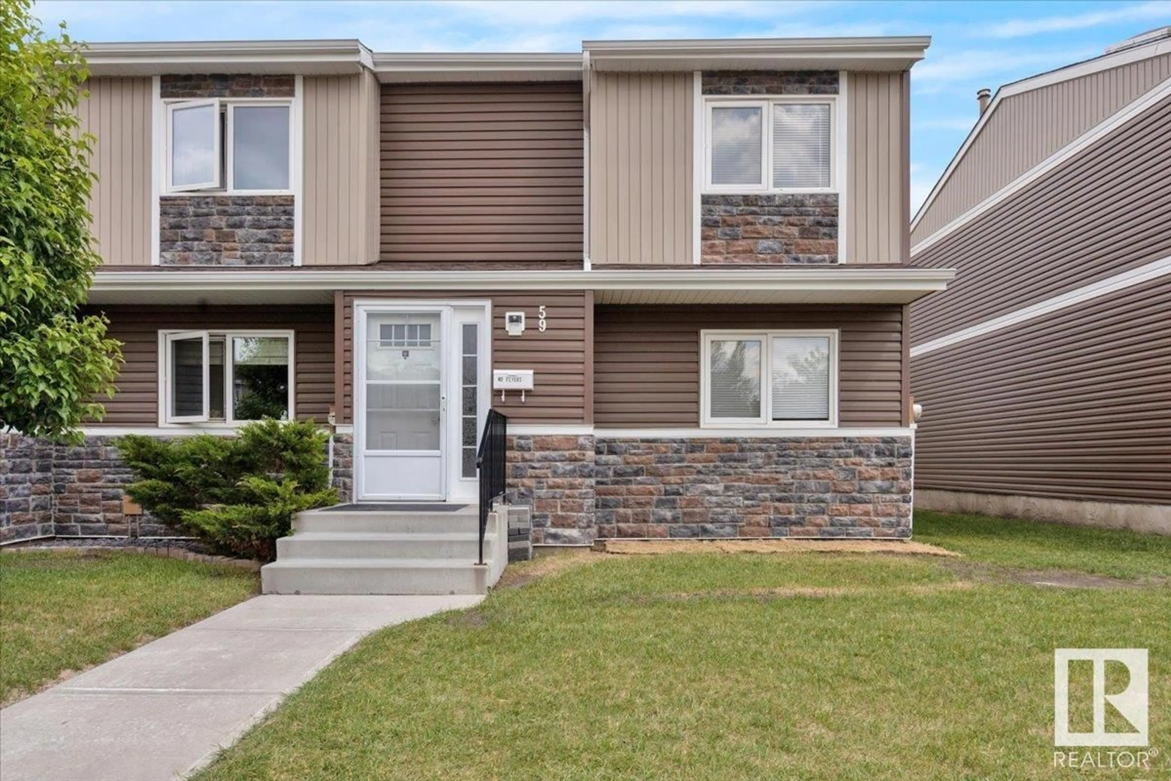 Home with vinyl exterior material, street for 59 - 3115 119 ST, Edmonton Alberta T6J5N5