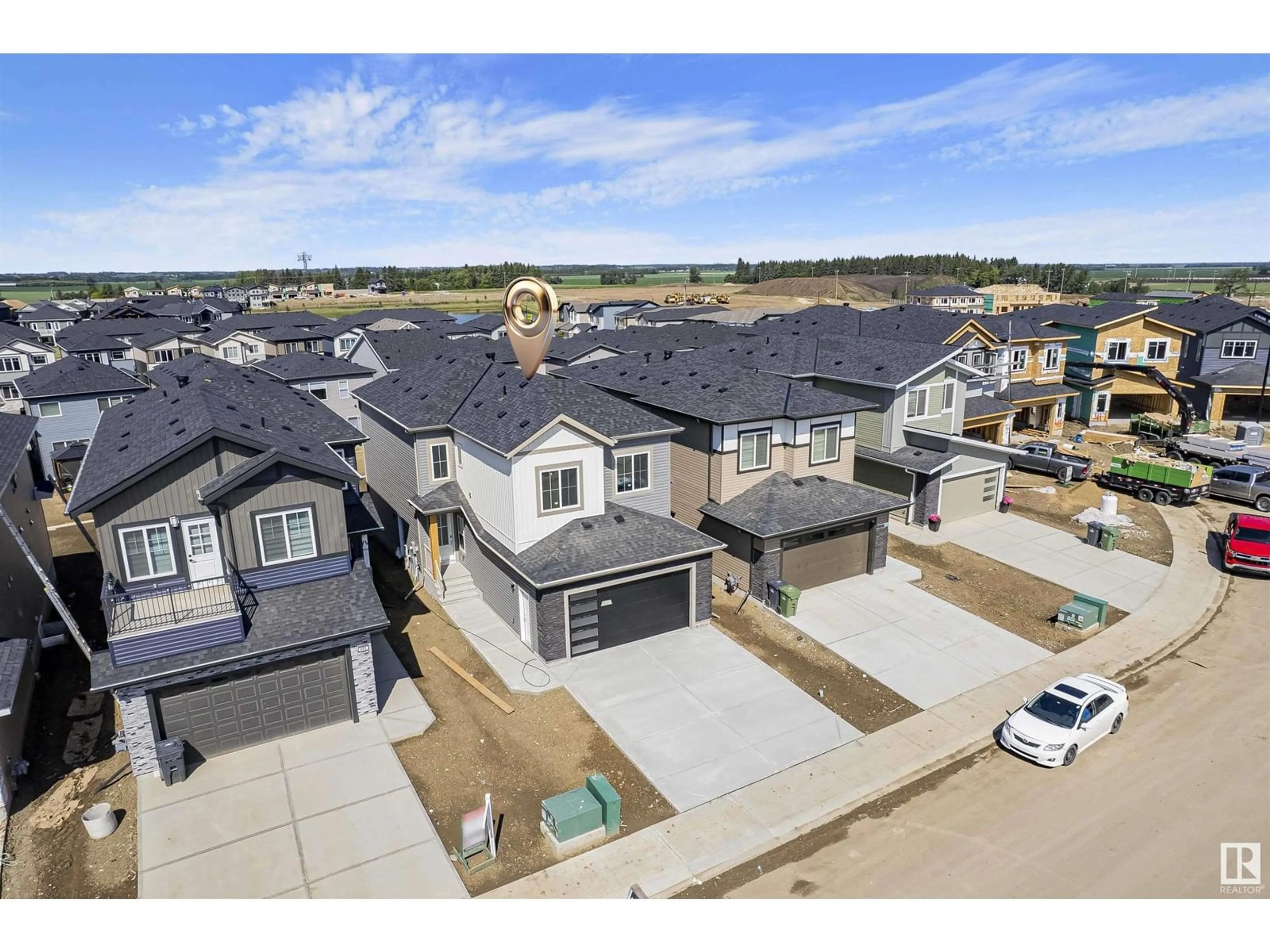A pic from outside/outdoor area/front of a property/back of a property/a pic from drone, street for 407 PINE POINT, Leduc Alberta T9E1S7
