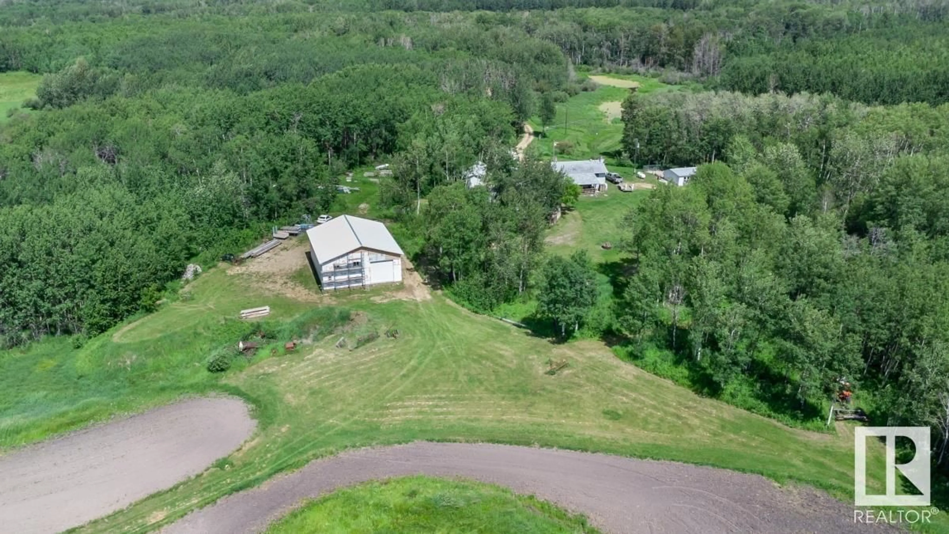 A pic from outside/outdoor area/front of a property/back of a property/a pic from drone, unknown for 50116 RANGE ROAD 202, Rural Beaver County Alberta T0B4J2