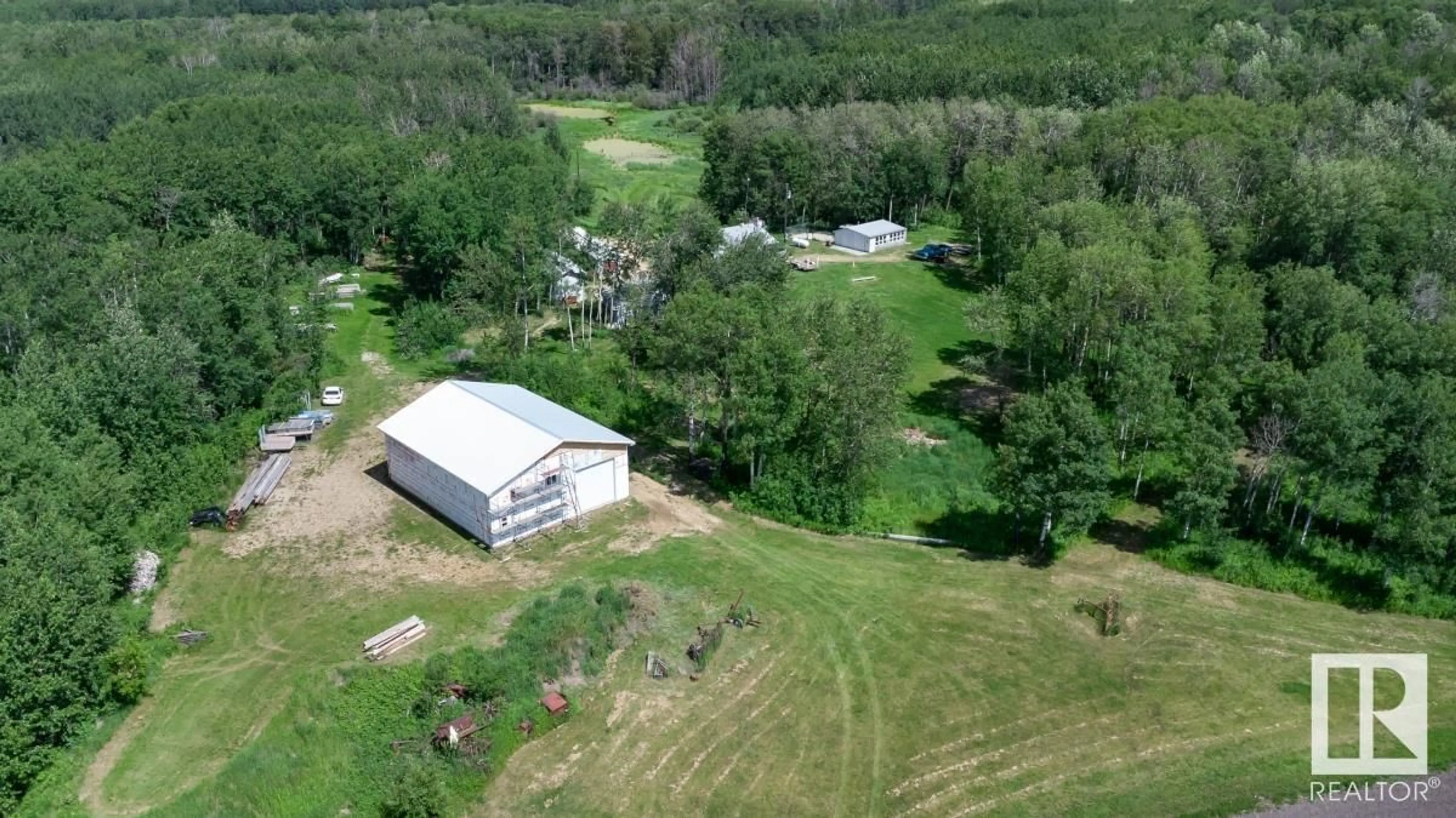 A pic from outside/outdoor area/front of a property/back of a property/a pic from drone, unknown for 50116 RANGE ROAD 202, Rural Beaver County Alberta T0B4J2
