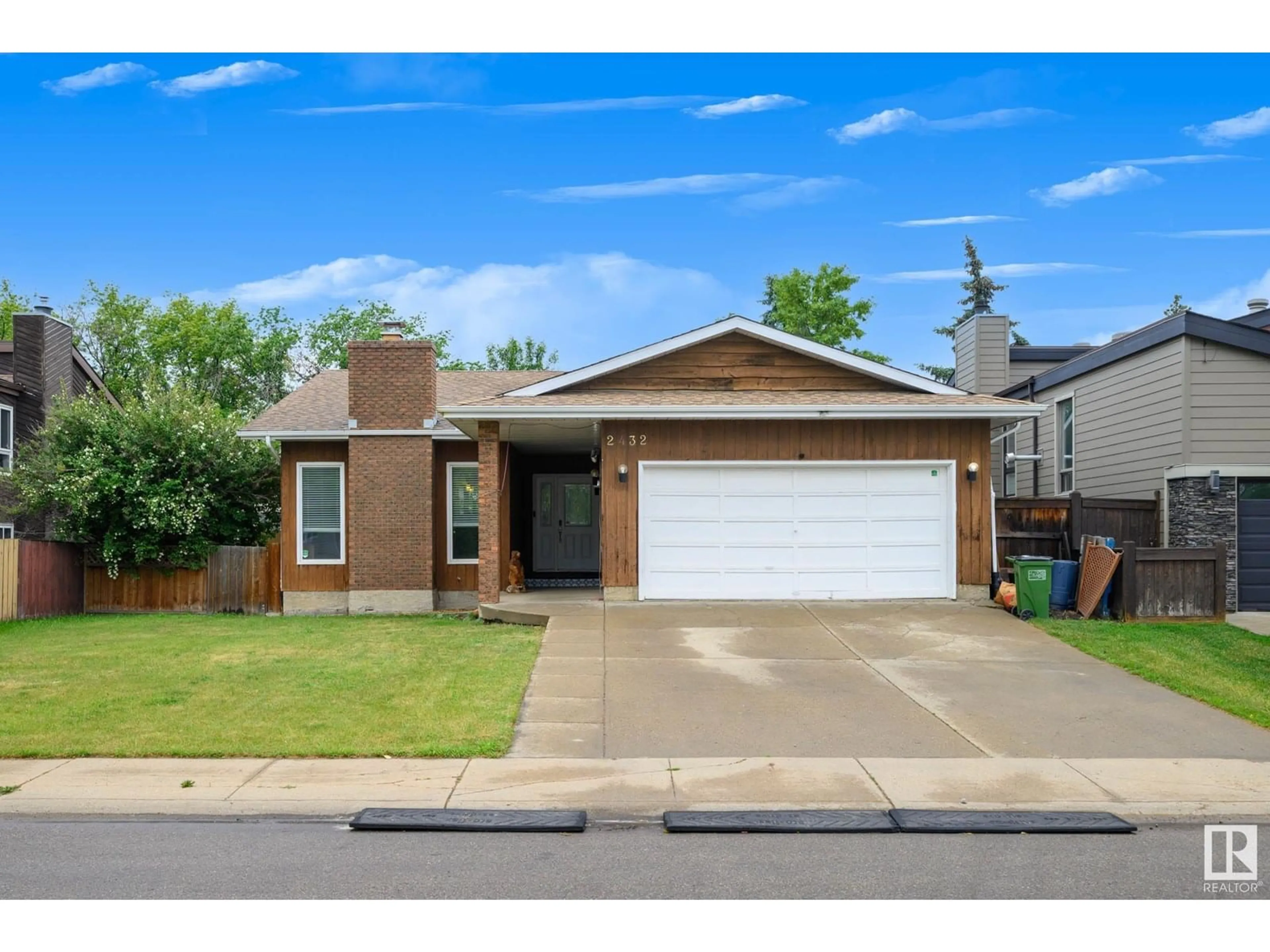Home with brick exterior material, street for 2432 106 ST, Edmonton Alberta T6J4K5