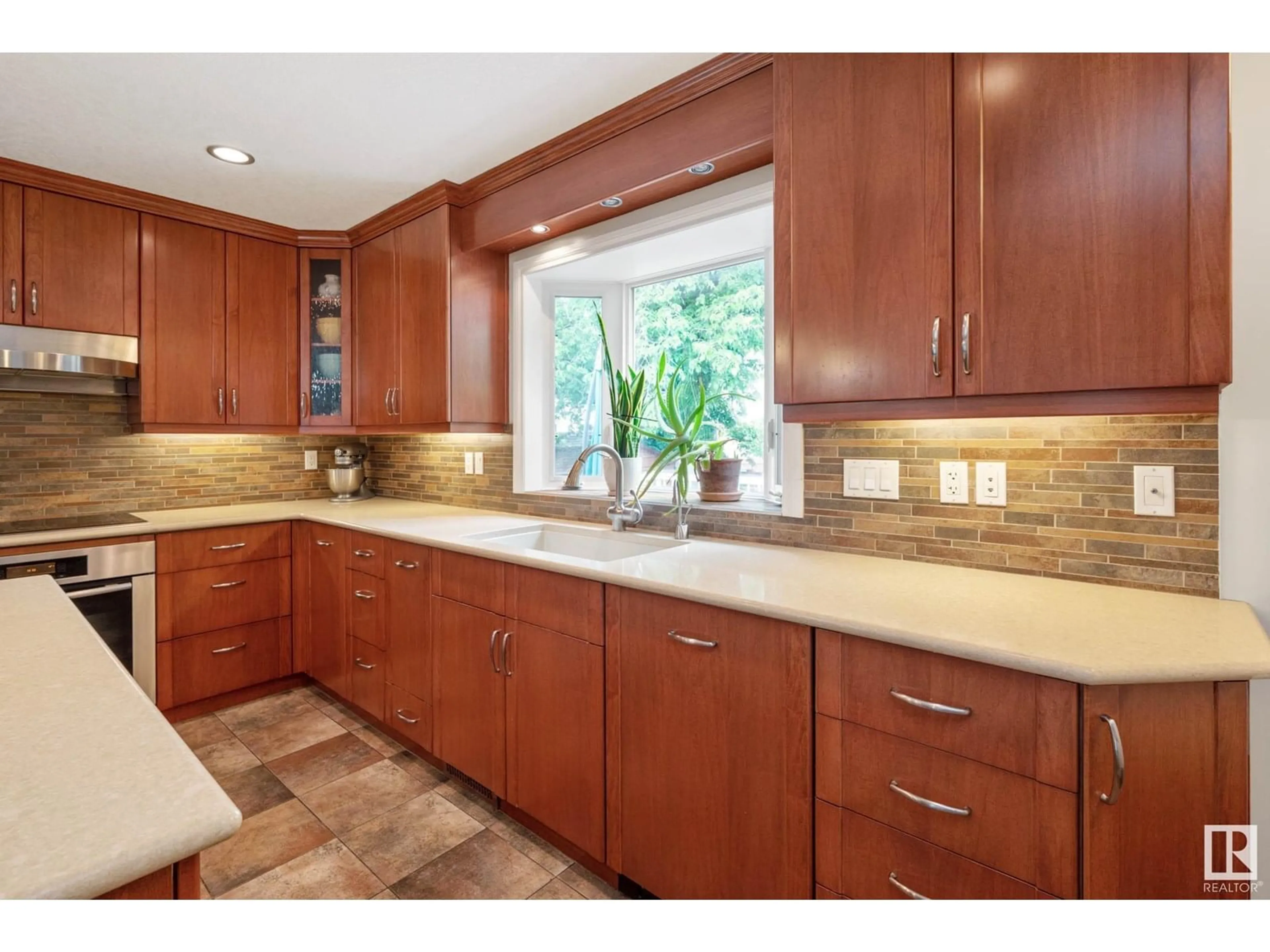 Open concept kitchen, ceramic/tile floor for 2432 106 ST, Edmonton Alberta T6J4K5