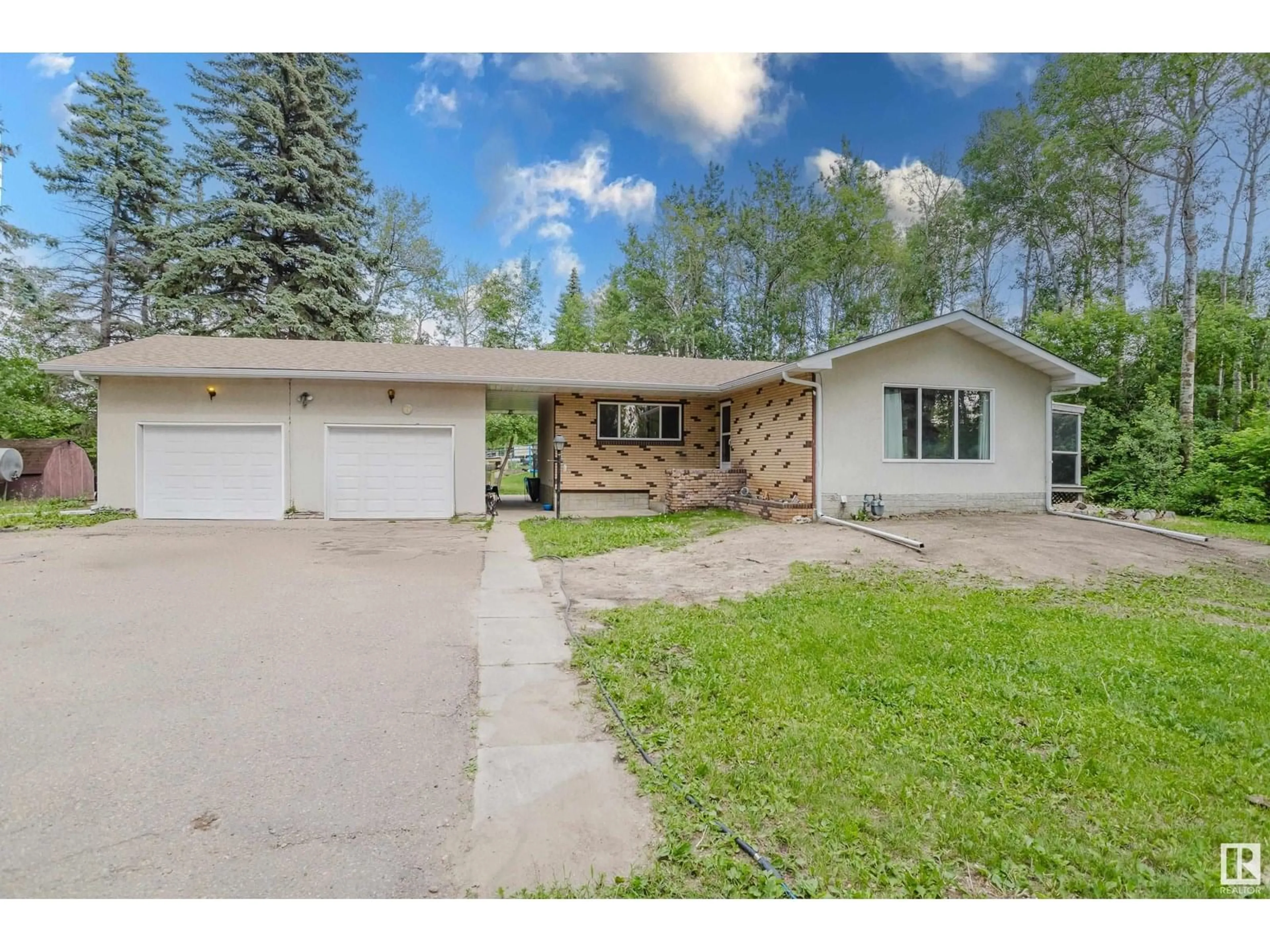 A pic from outside/outdoor area/front of a property/back of a property/a pic from drone, street for 22559 - 379 WYE RD, Rural Strathcona County Alberta T8C1H9