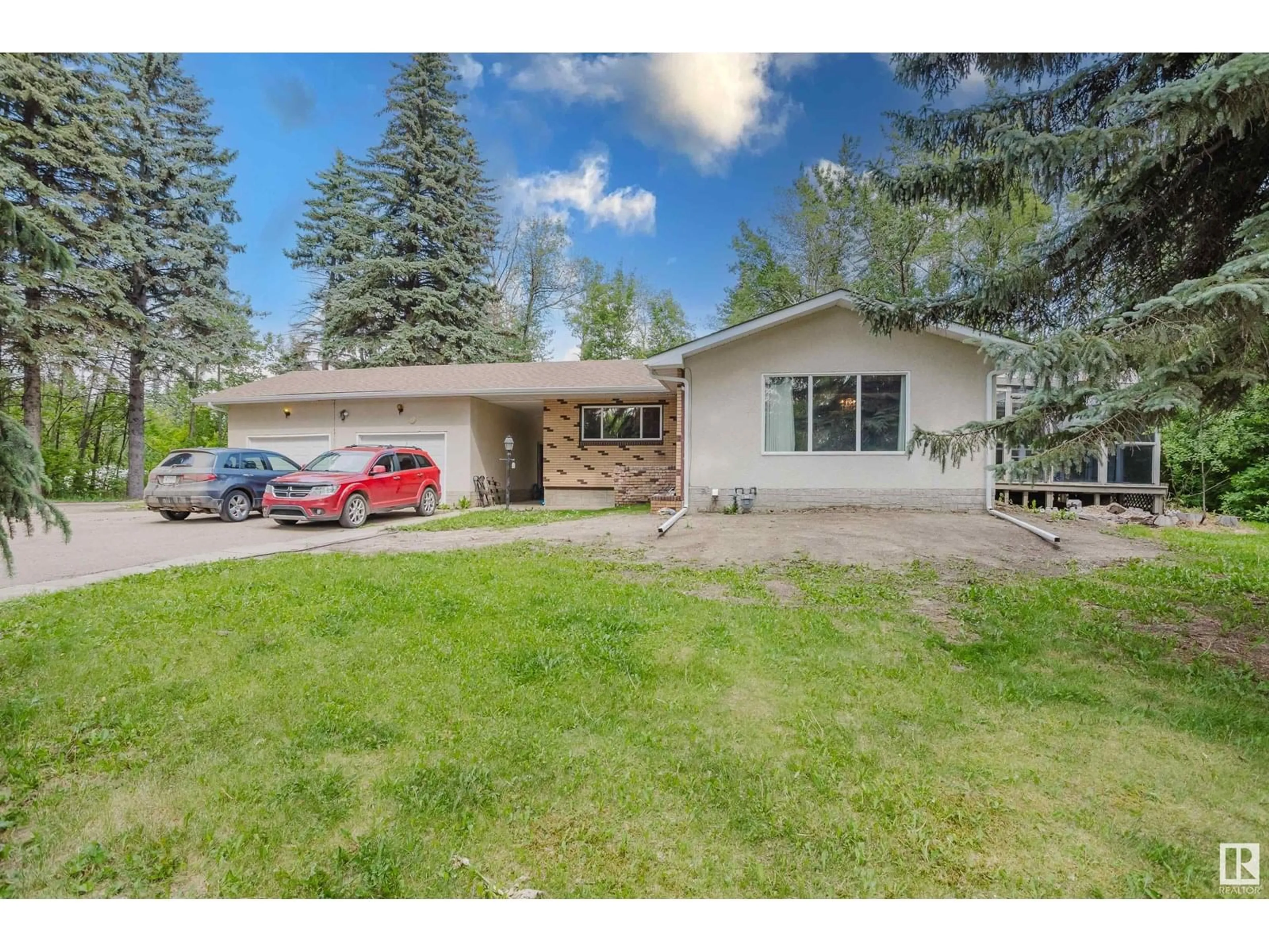 A pic from outside/outdoor area/front of a property/back of a property/a pic from drone, street for 22559 - 379 WYE RD, Rural Strathcona County Alberta T8C1H9