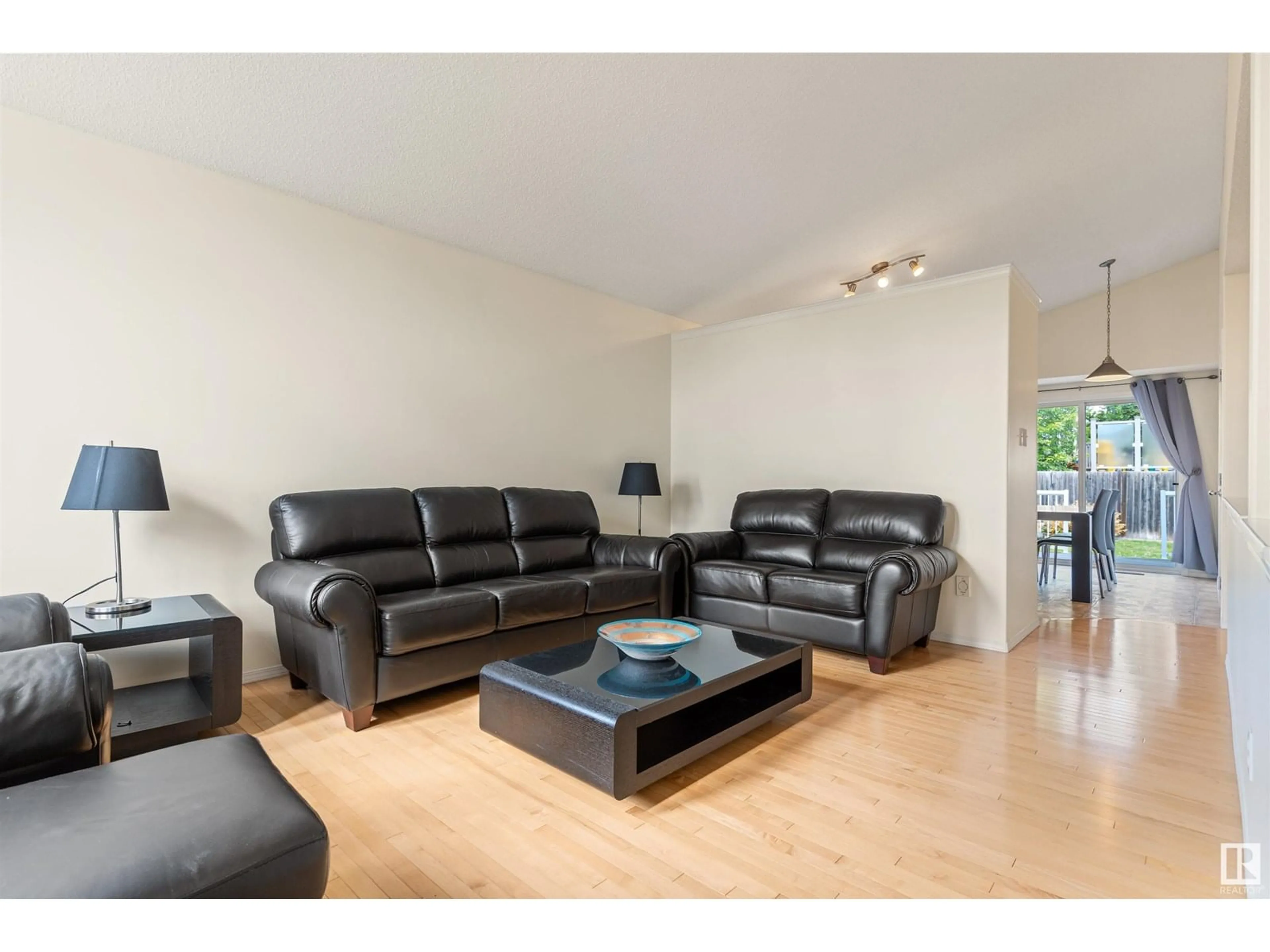 Living room with furniture, wood/laminate floor for 124 CHRISTINA WY, Sherwood Park Alberta T8H2K5