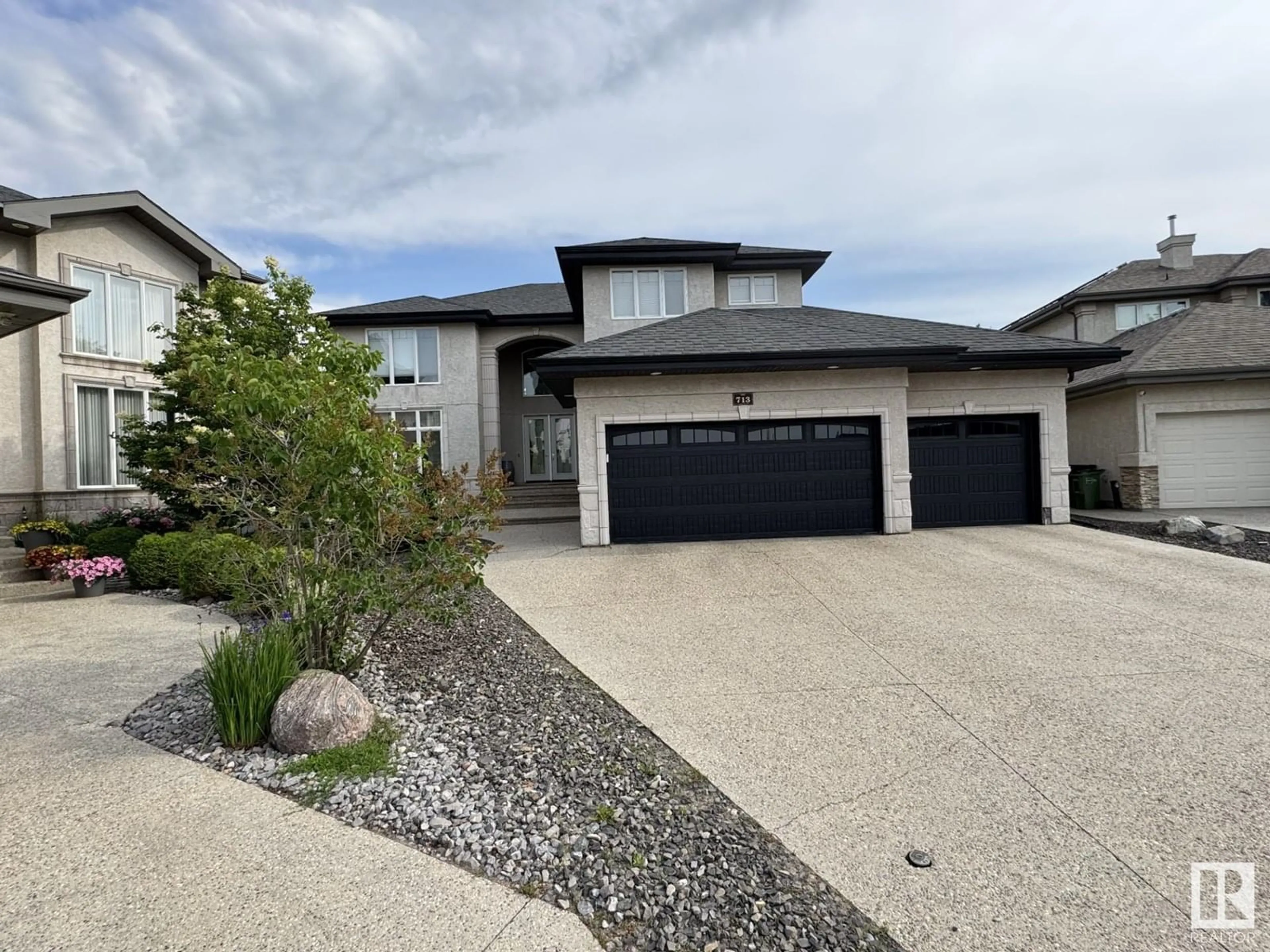 A pic from outside/outdoor area/front of a property/back of a property/a pic from drone, street for 713 MASSEY WY, Edmonton Alberta T6R3S6