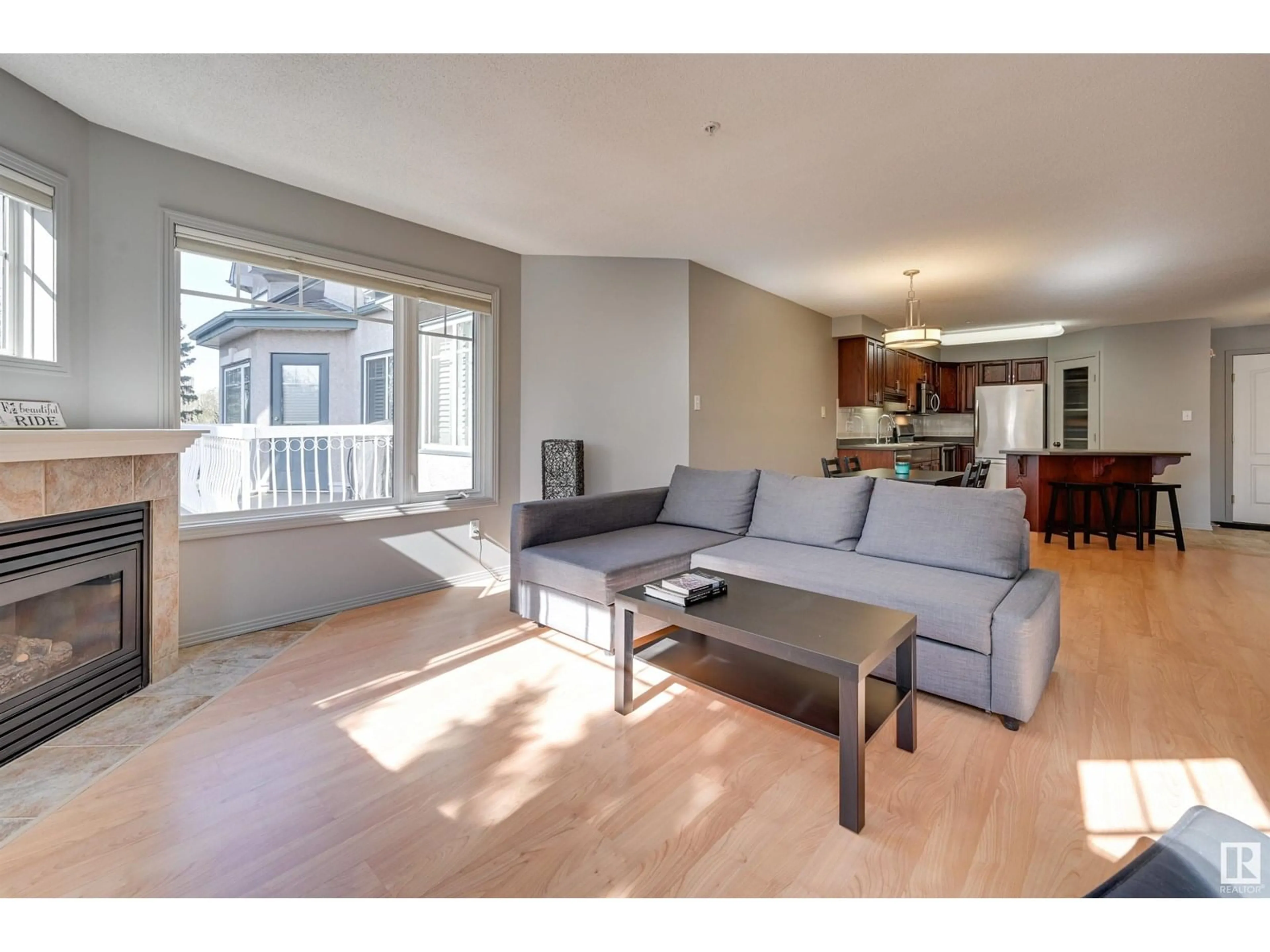 Living room with furniture, wood/laminate floor for #305 - 8909 100 ST, Edmonton Alberta T6E6T4