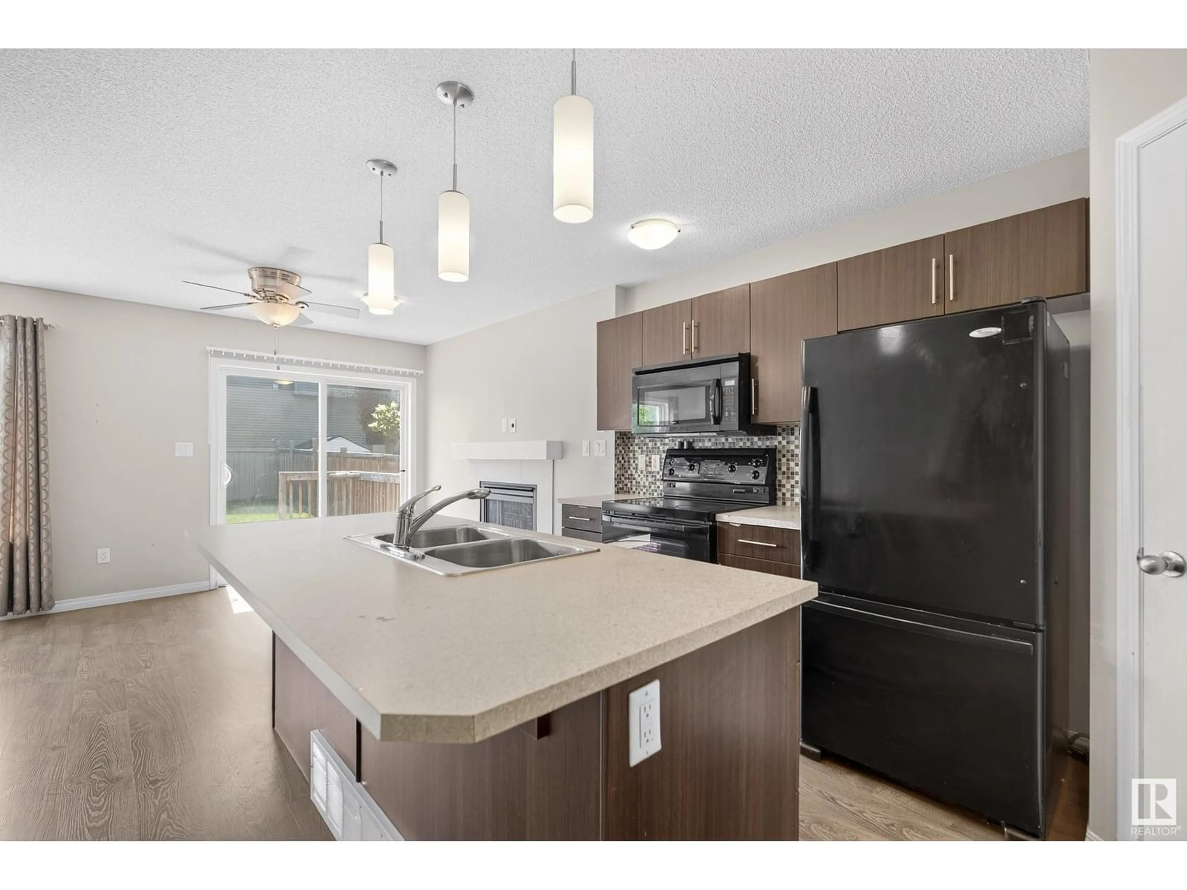 Open concept kitchen, unknown for 1945 CHAPMAN RD, Edmonton Alberta T6W0Y6
