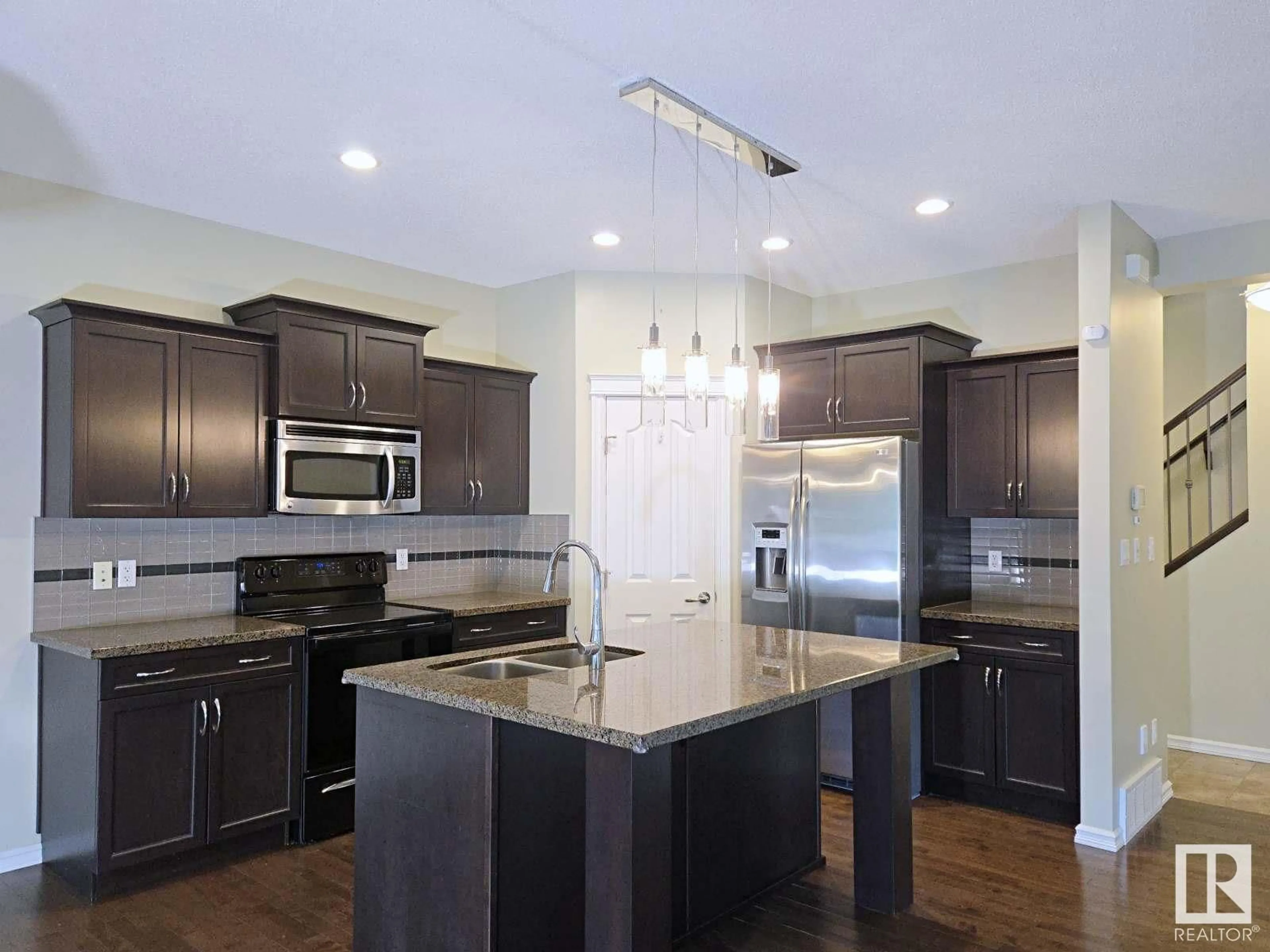 Open concept kitchen, unknown for 716 ADAMS WY, Edmonton Alberta T6W0K2