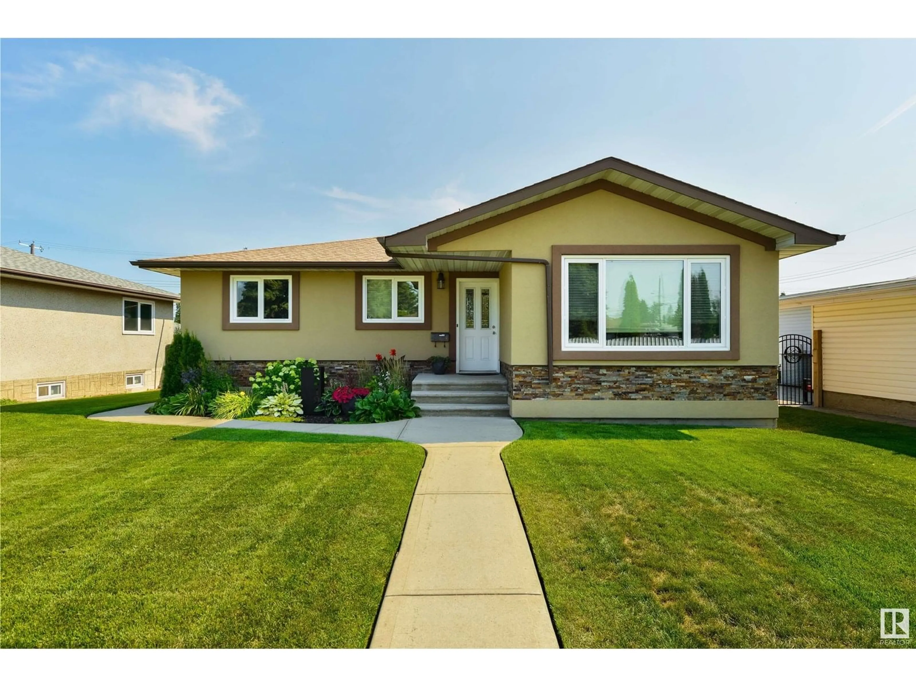 Home with vinyl exterior material, street for 9219 62 ST, Edmonton Alberta T6B1N9