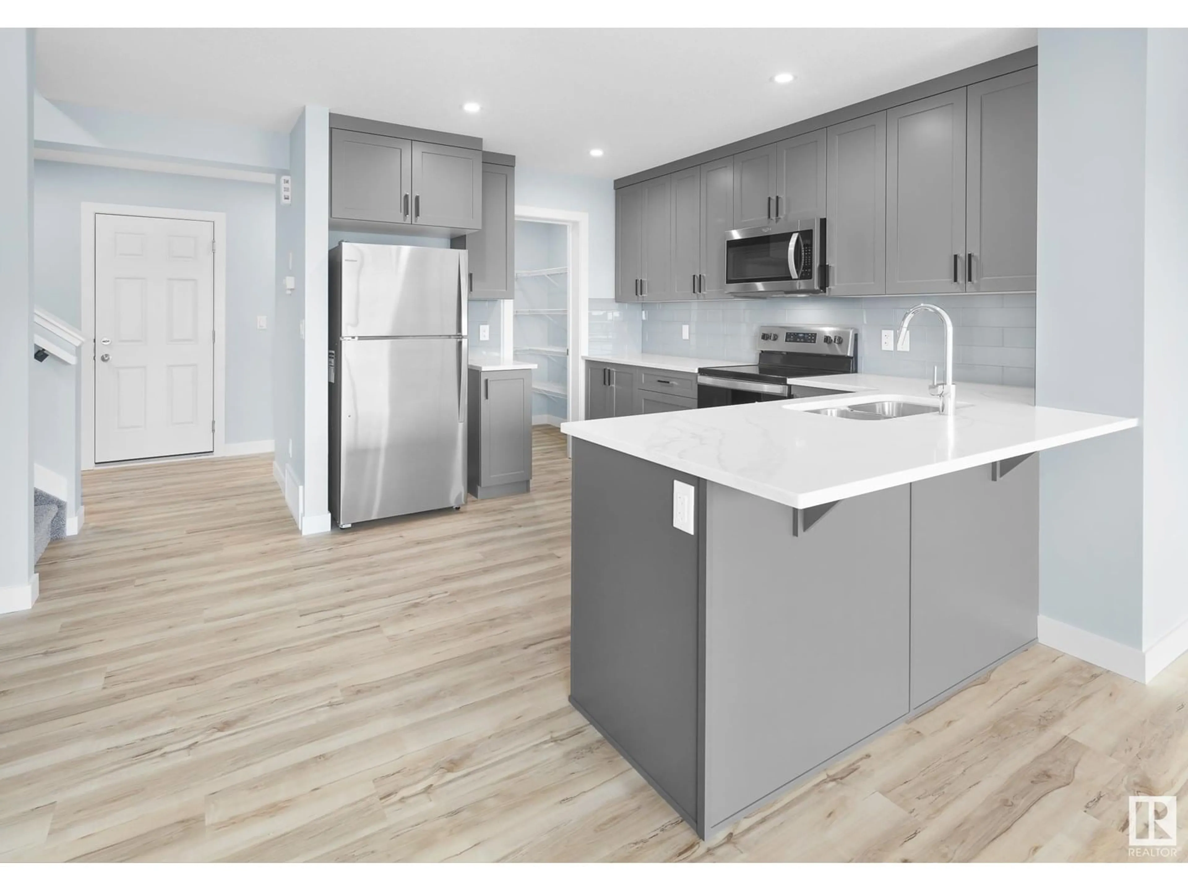 Open concept kitchen, unknown for 754 BERG LO, Leduc Alberta T9E1G7