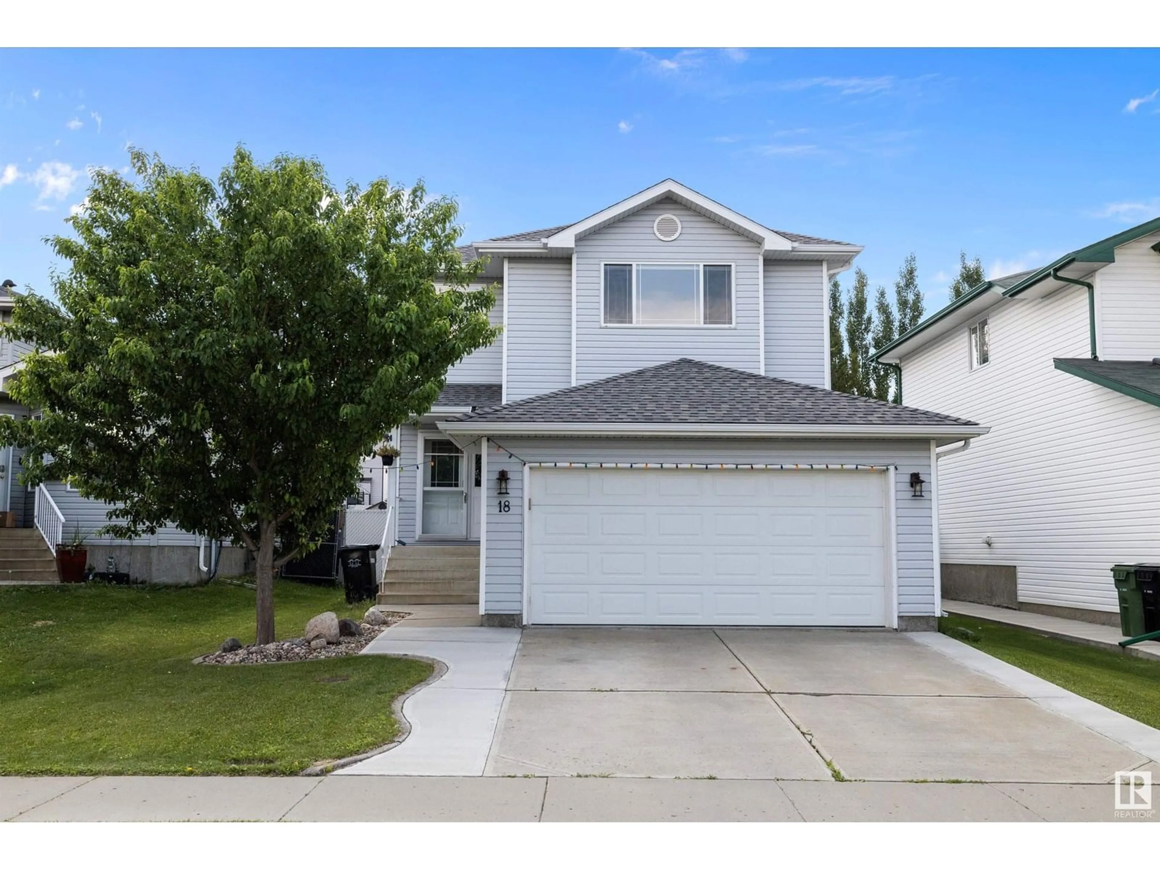Home with vinyl exterior material, street for 18 BRIDGEPORT BV, Leduc Alberta T9E8G8