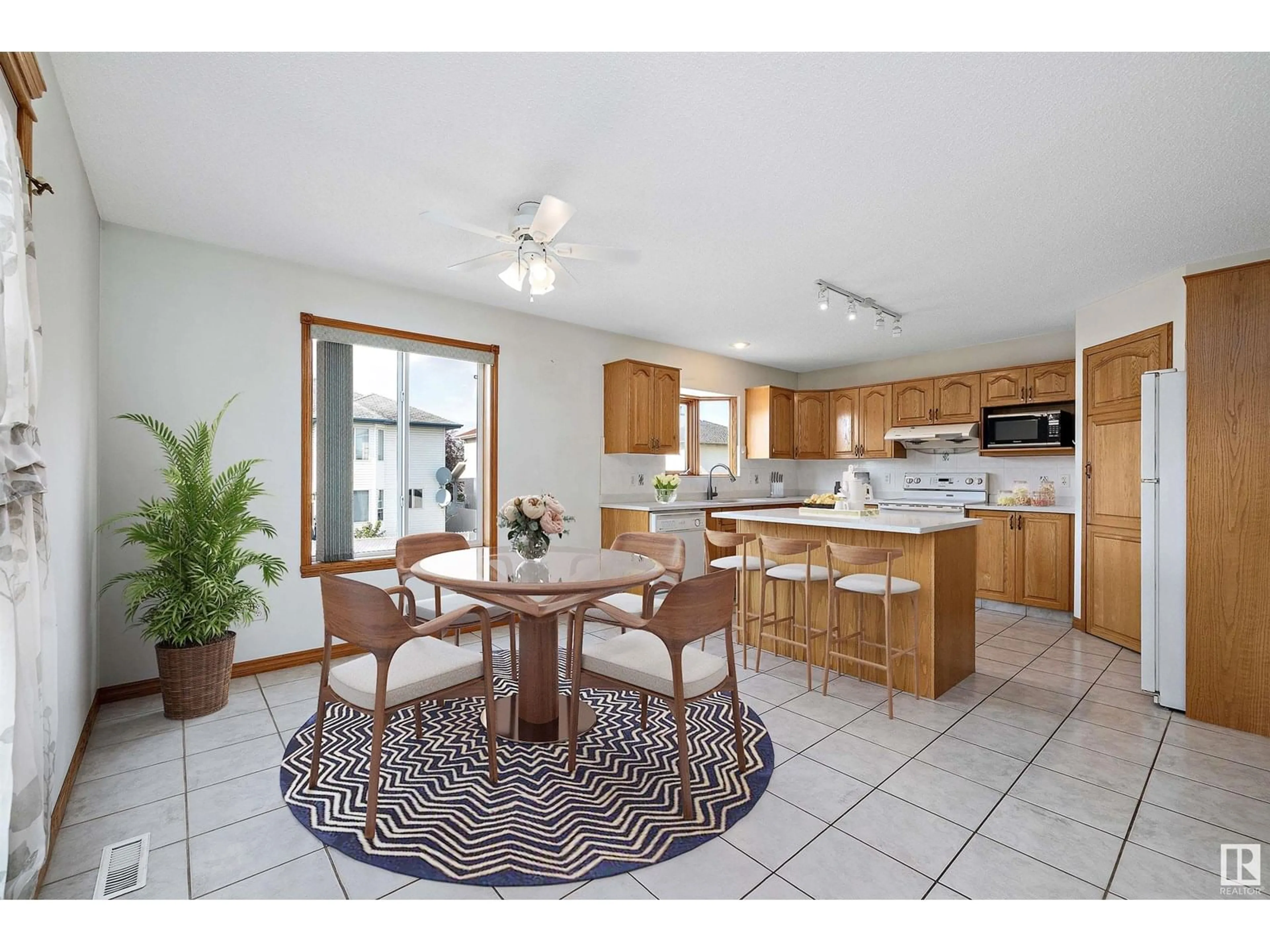 Open concept kitchen, ceramic/tile floor for 16053 84 ST, Edmonton Alberta T5Z3G5