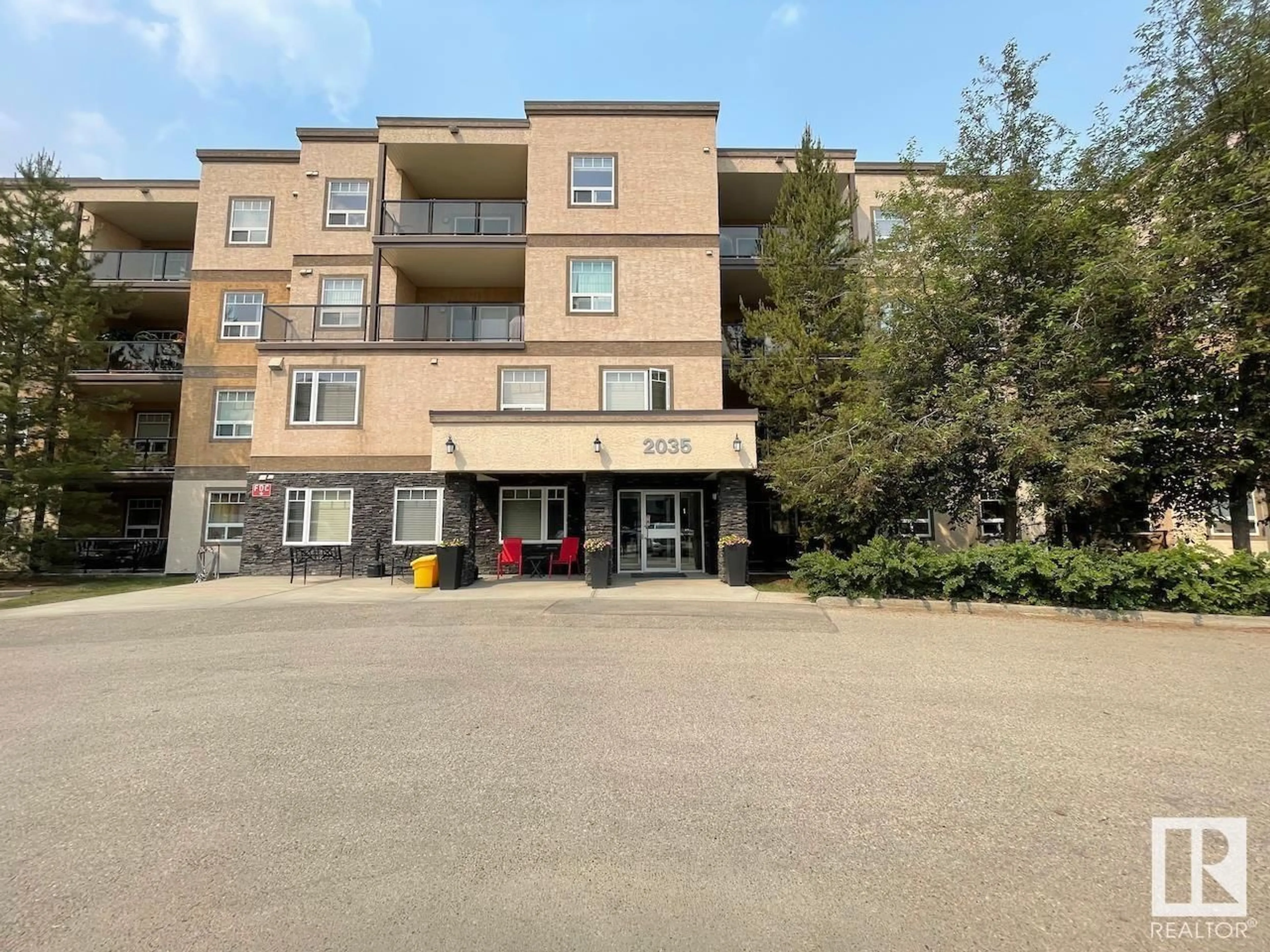 A pic from outside/outdoor area/front of a property/back of a property/a pic from drone, building for #112 - 2035 GRANTHAM CO, Edmonton Alberta T5T3X4