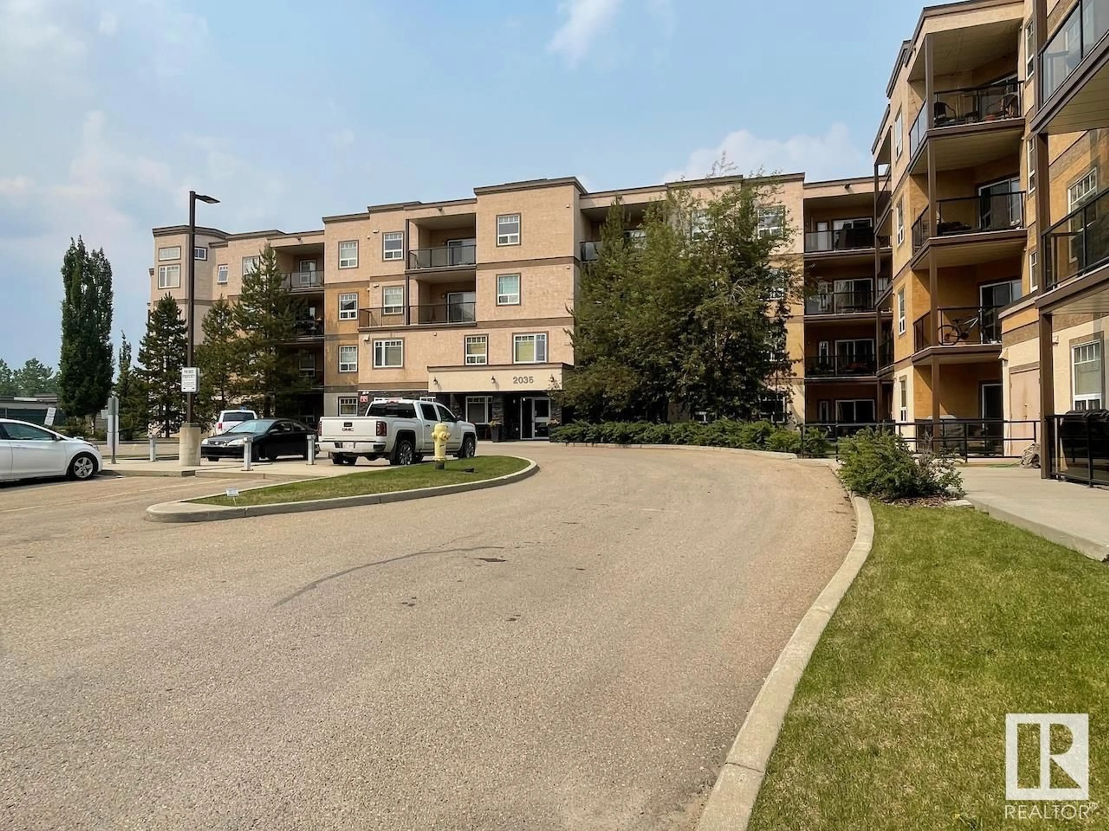 A pic from outside/outdoor area/front of a property/back of a property/a pic from drone, street for #112 - 2035 GRANTHAM CO, Edmonton Alberta T5T3X4