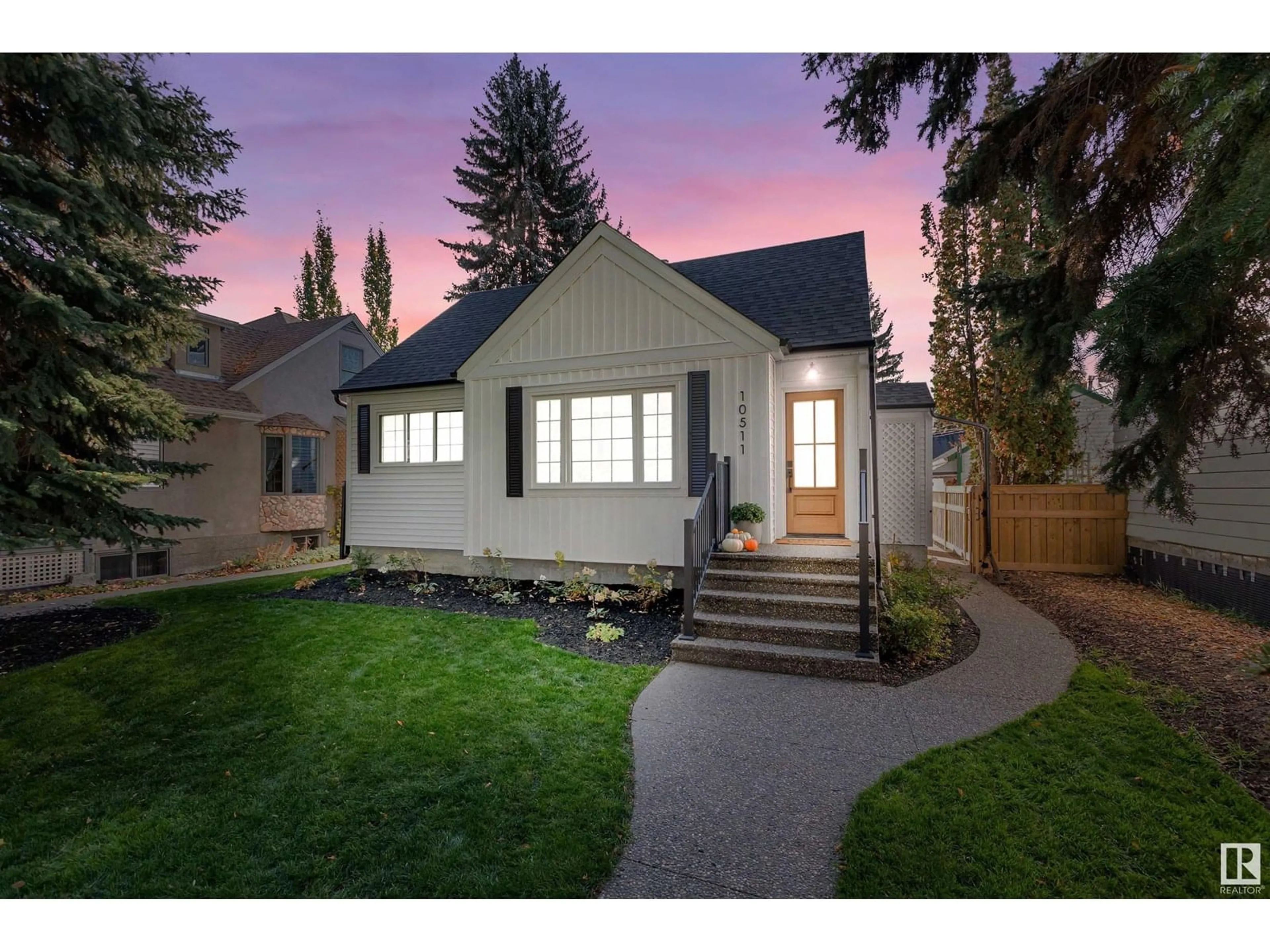 Home with vinyl exterior material, street for 10511 68 AV, Edmonton Alberta T6H2B2