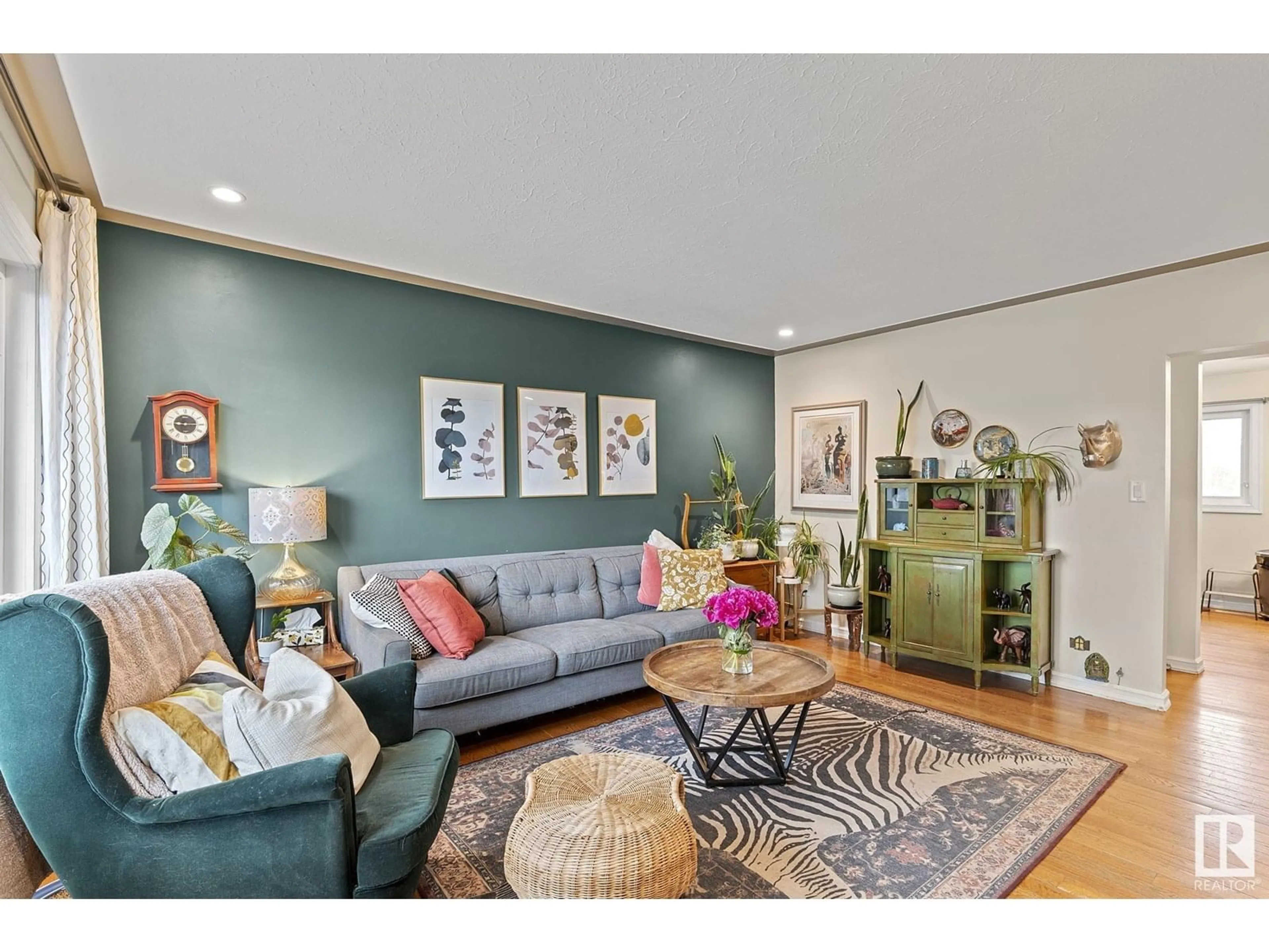 Living room with furniture, unknown for 10706 129 AV, Edmonton Alberta T5E0L4