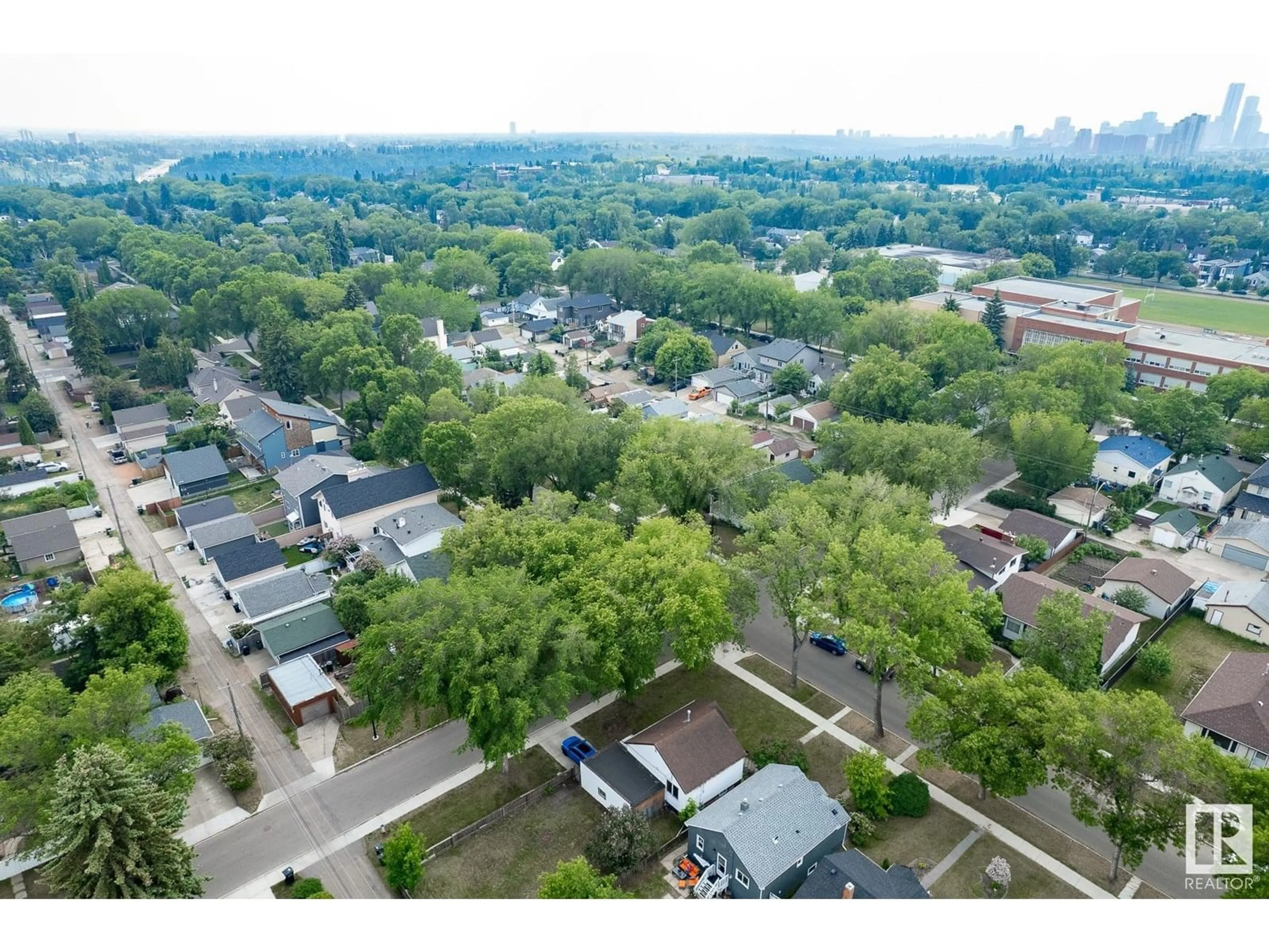 A pic from outside/outdoor area/front of a property/back of a property/a pic from drone, unknown for NW - 11503 67 ST, Edmonton Alberta T5B1L6