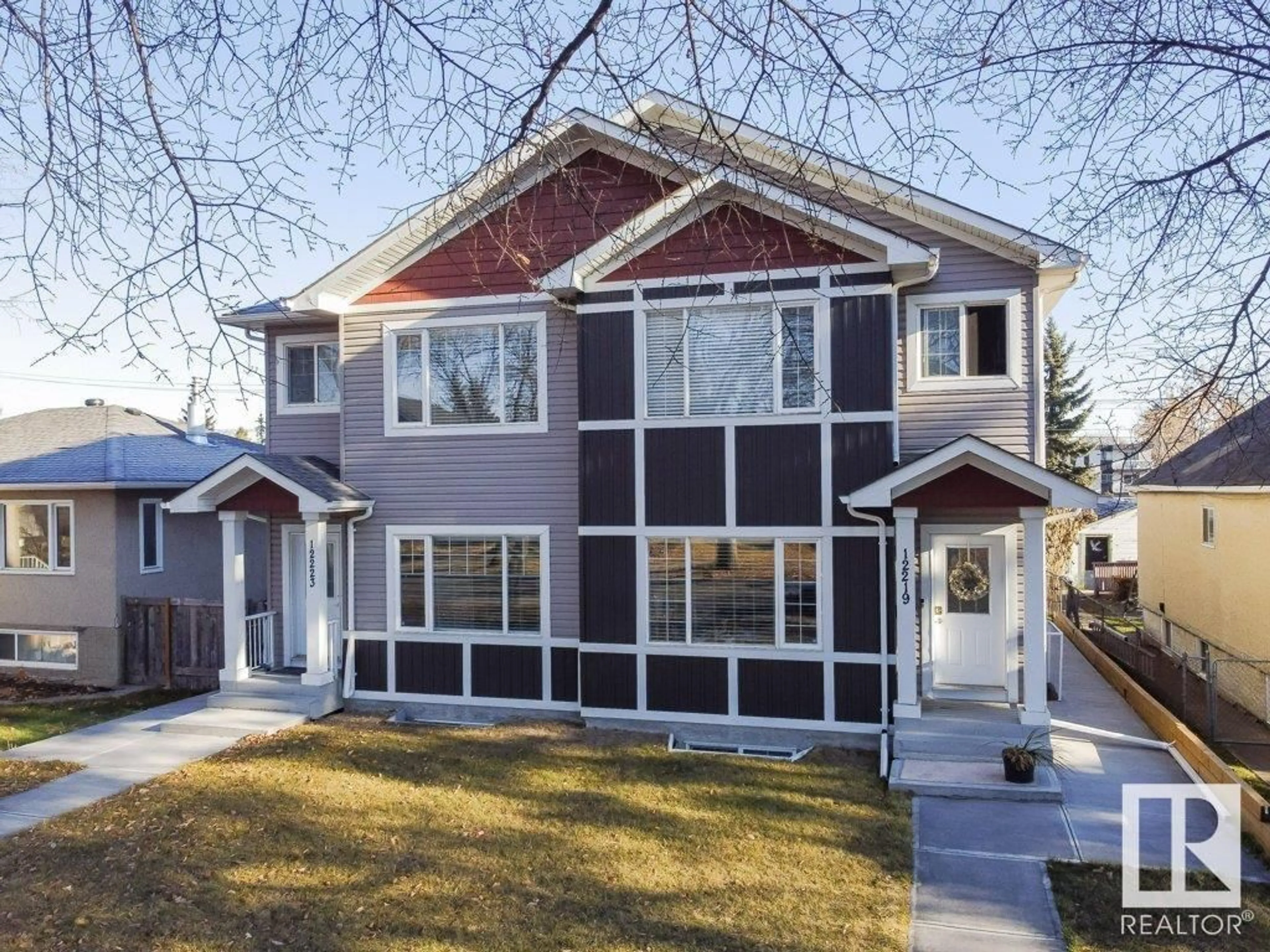 Home with vinyl exterior material, street for NW - 12219 101 ST, Edmonton Alberta T5G2C5