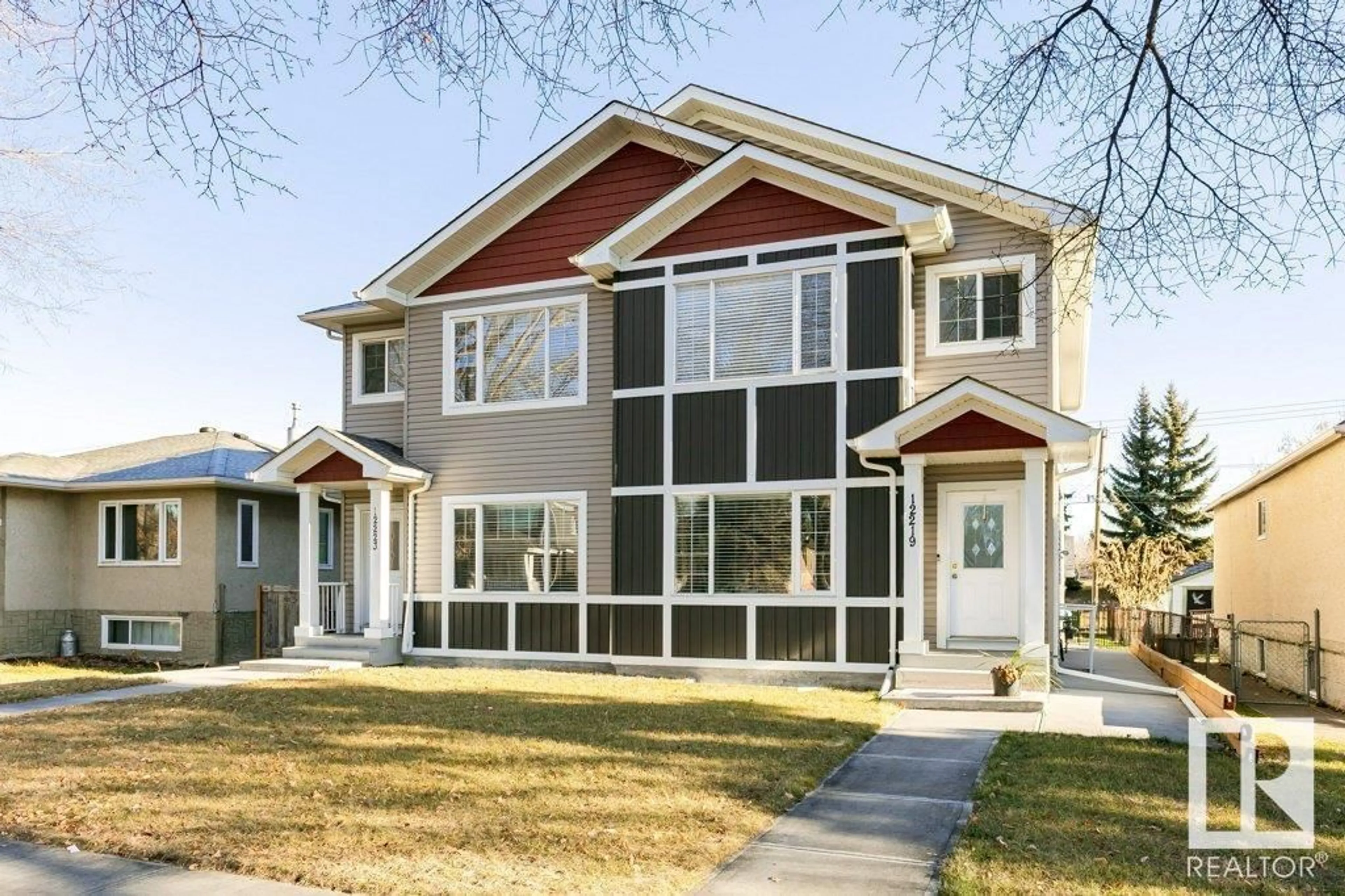 Home with vinyl exterior material, street for NW - 12219 101 ST, Edmonton Alberta T5G2C5