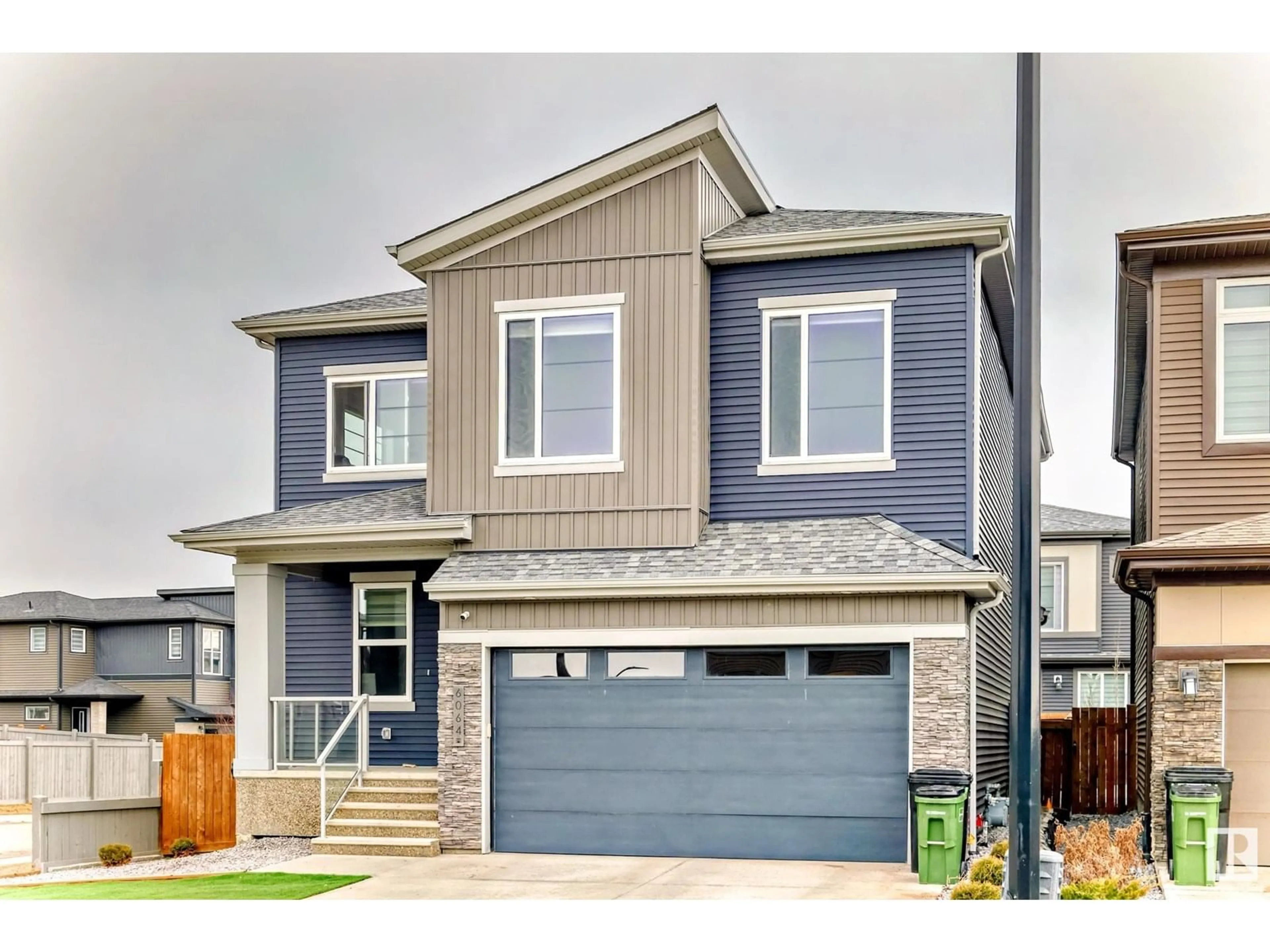 Home with vinyl exterior material, street for 6064 KING LANDING LD, Edmonton Alberta T6W4K5