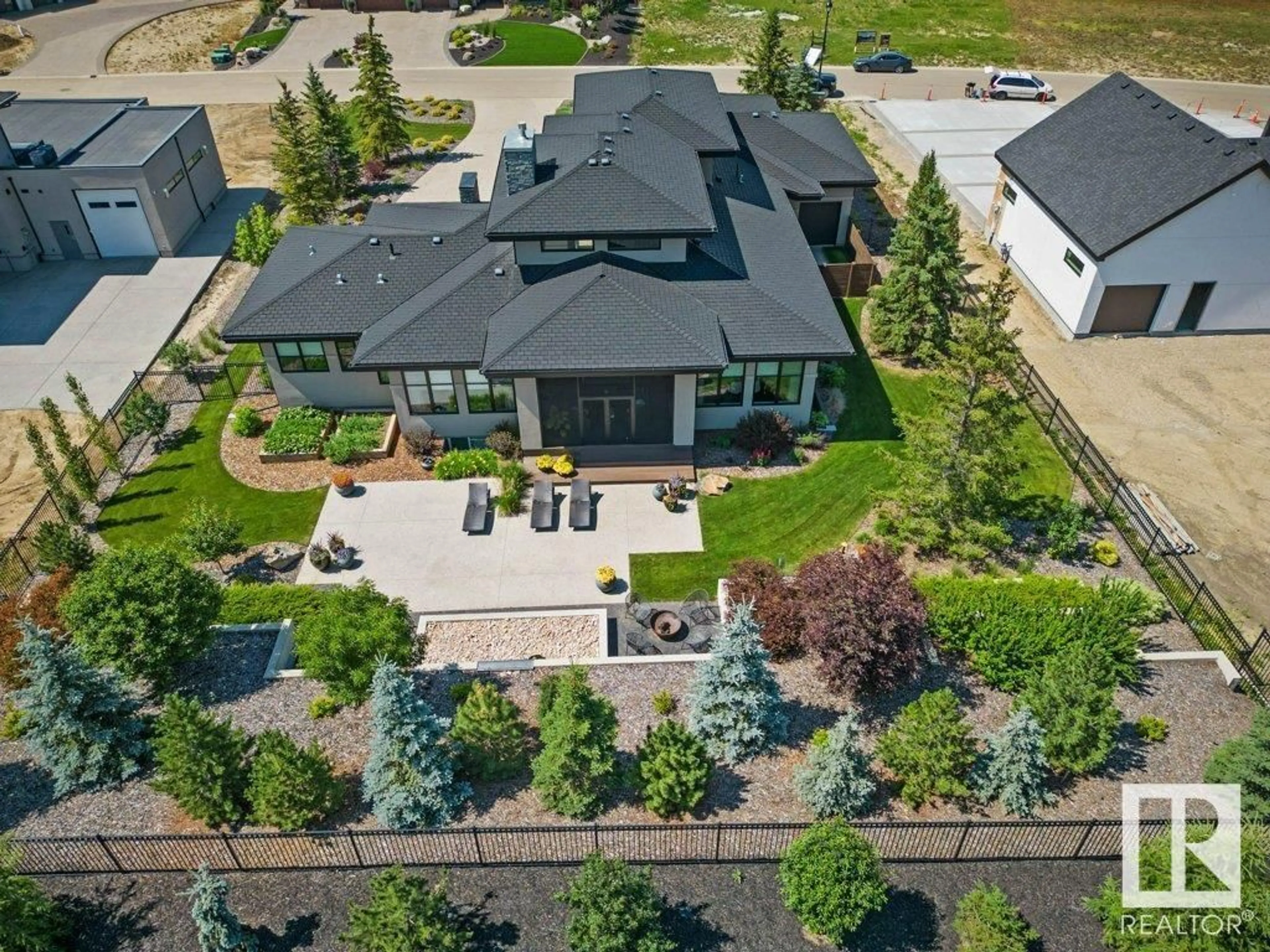 A pic from outside/outdoor area/front of a property/back of a property/a pic from drone, street for #212 - 25122 STURGEON RD, Rural Sturgeon County Alberta T8T1S6