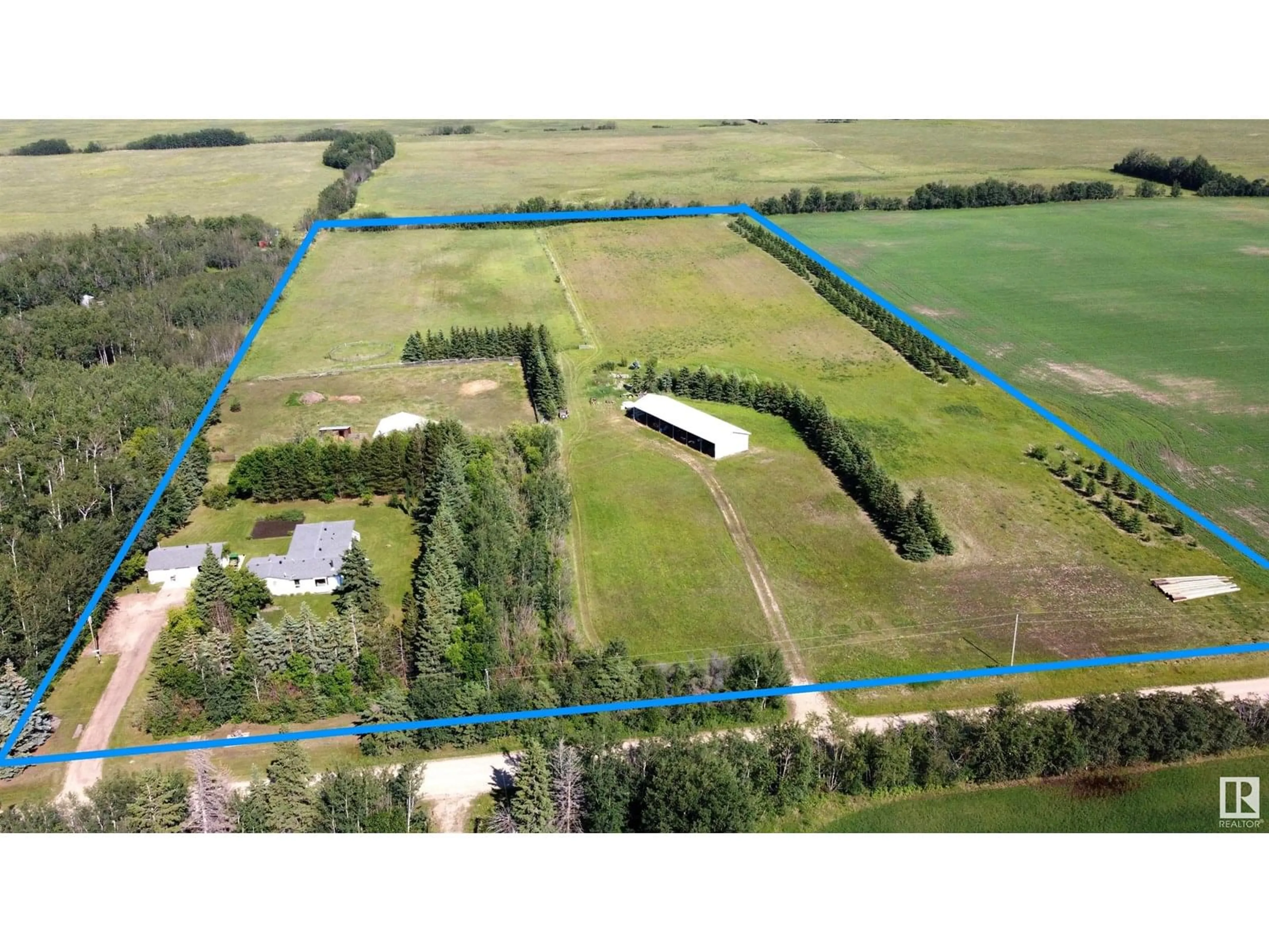 A pic from outside/outdoor area/front of a property/back of a property/a pic from drone, building for 57015 RGE RD 271, Rural Sturgeon County Alberta T8R1W9