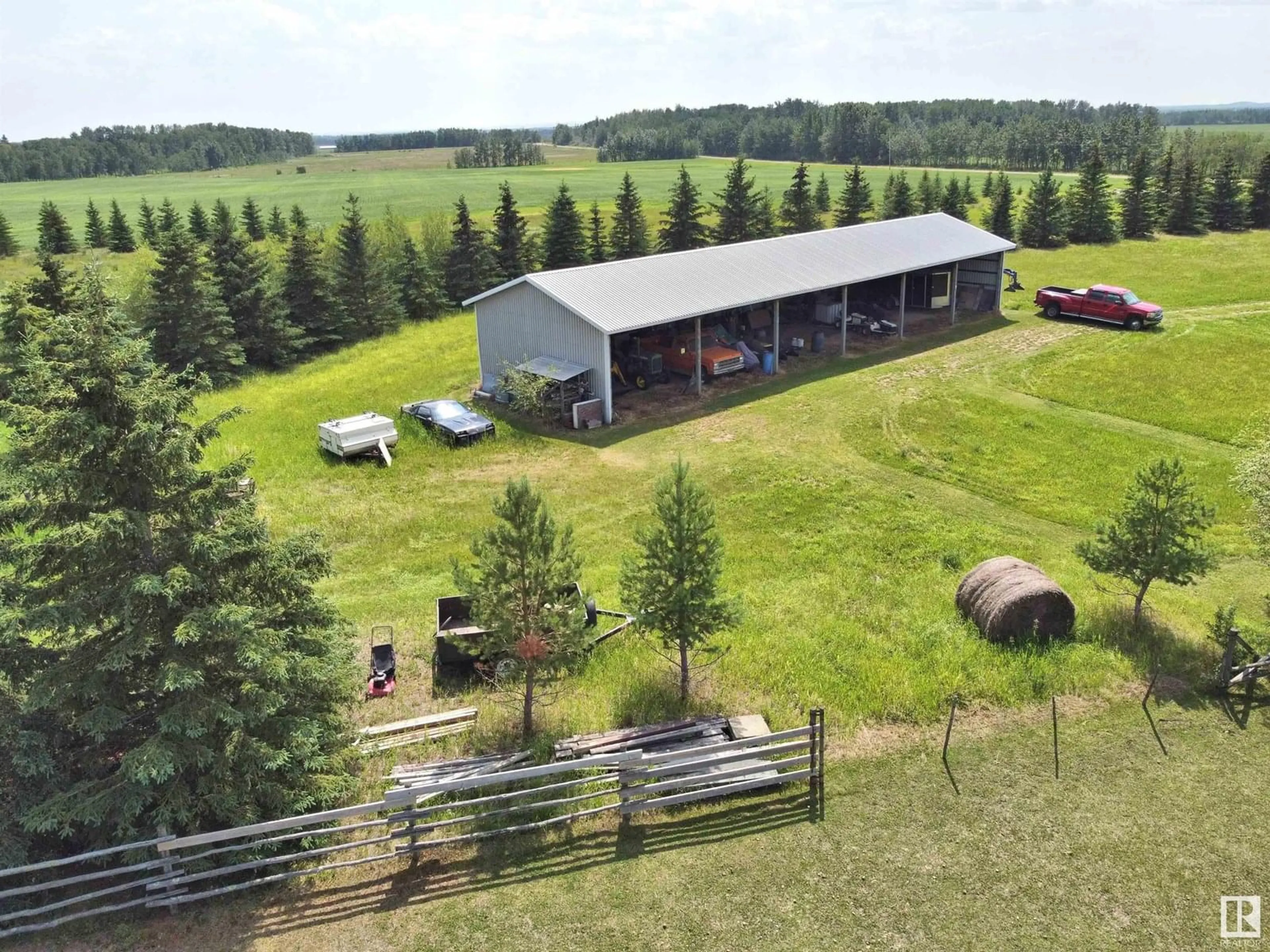 A pic from outside/outdoor area/front of a property/back of a property/a pic from drone, unknown for 57015 RGE RD 271, Rural Sturgeon County Alberta T8R1W9