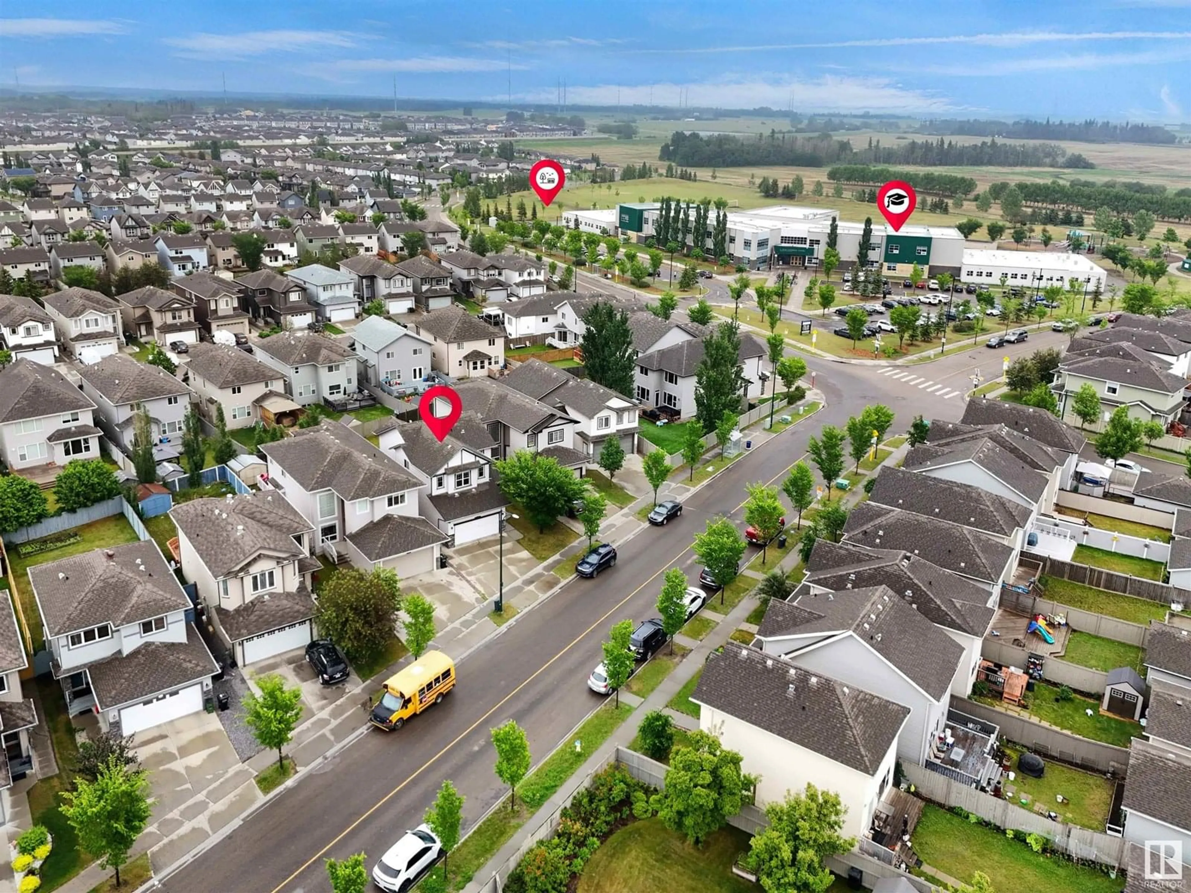 A pic from outside/outdoor area/front of a property/back of a property/a pic from drone, street for 615 TAMARACK RD, Edmonton Alberta T6T0J3