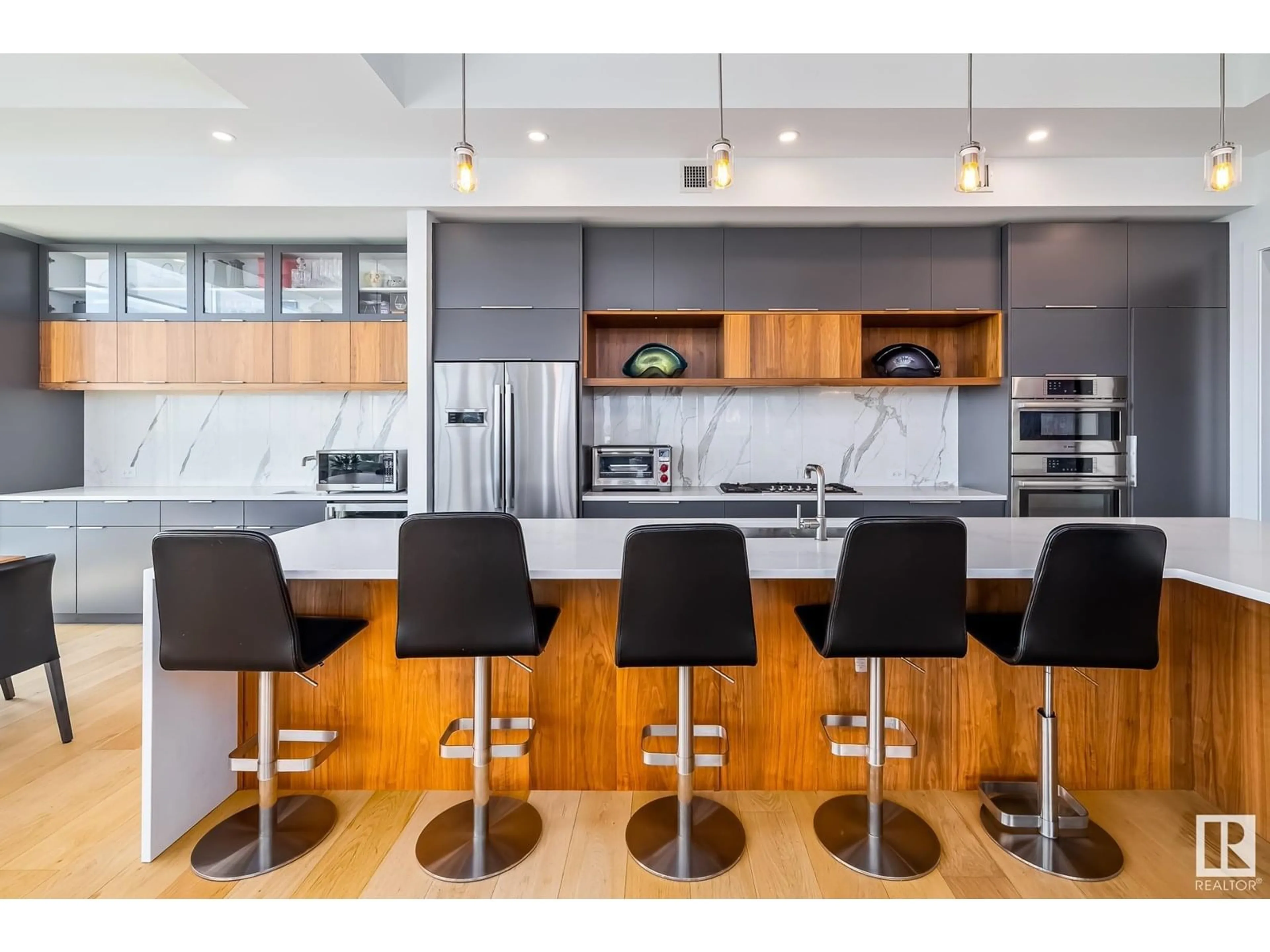 Open concept kitchen, wood/laminate floor for 14105 - 1403 BLOCK DR, Edmonton Alberta T5N1L5