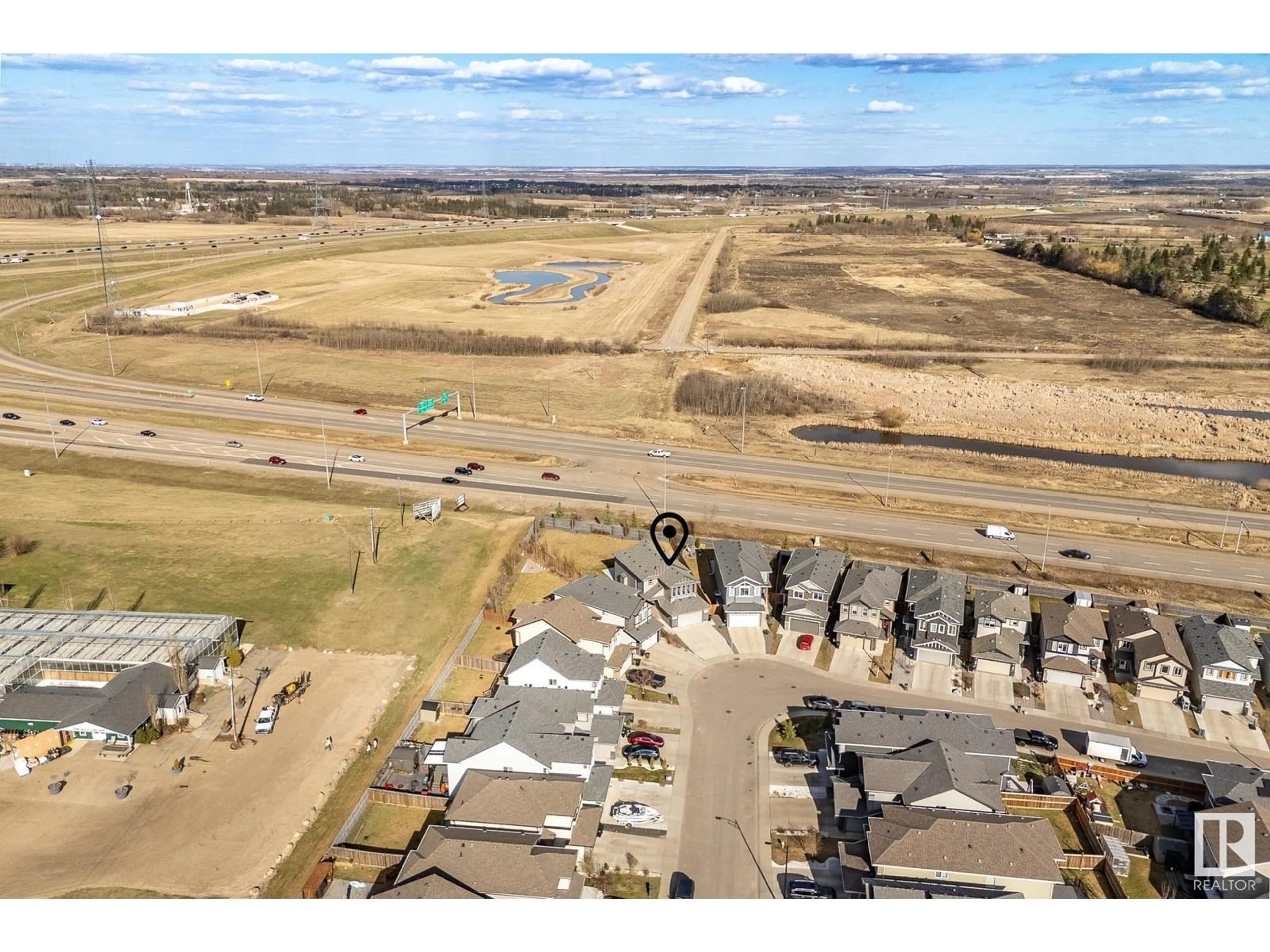 A pic from outside/outdoor area/front of a property/back of a property/a pic from drone, street for NW - 16799 36 ST, Edmonton Alberta T5Y0X7