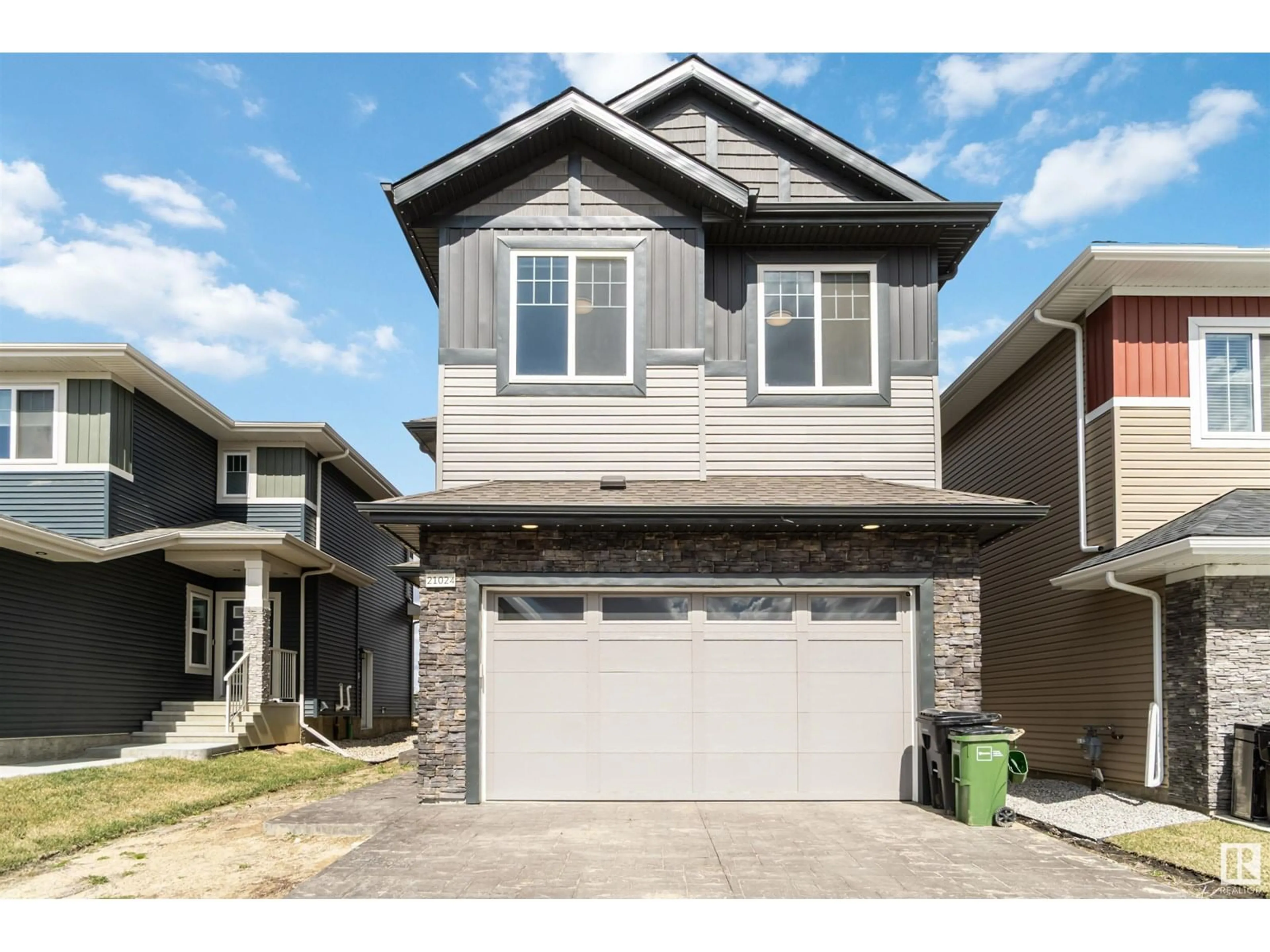Home with vinyl exterior material, street for 21024 128 AV, Edmonton Alberta T5V1C0