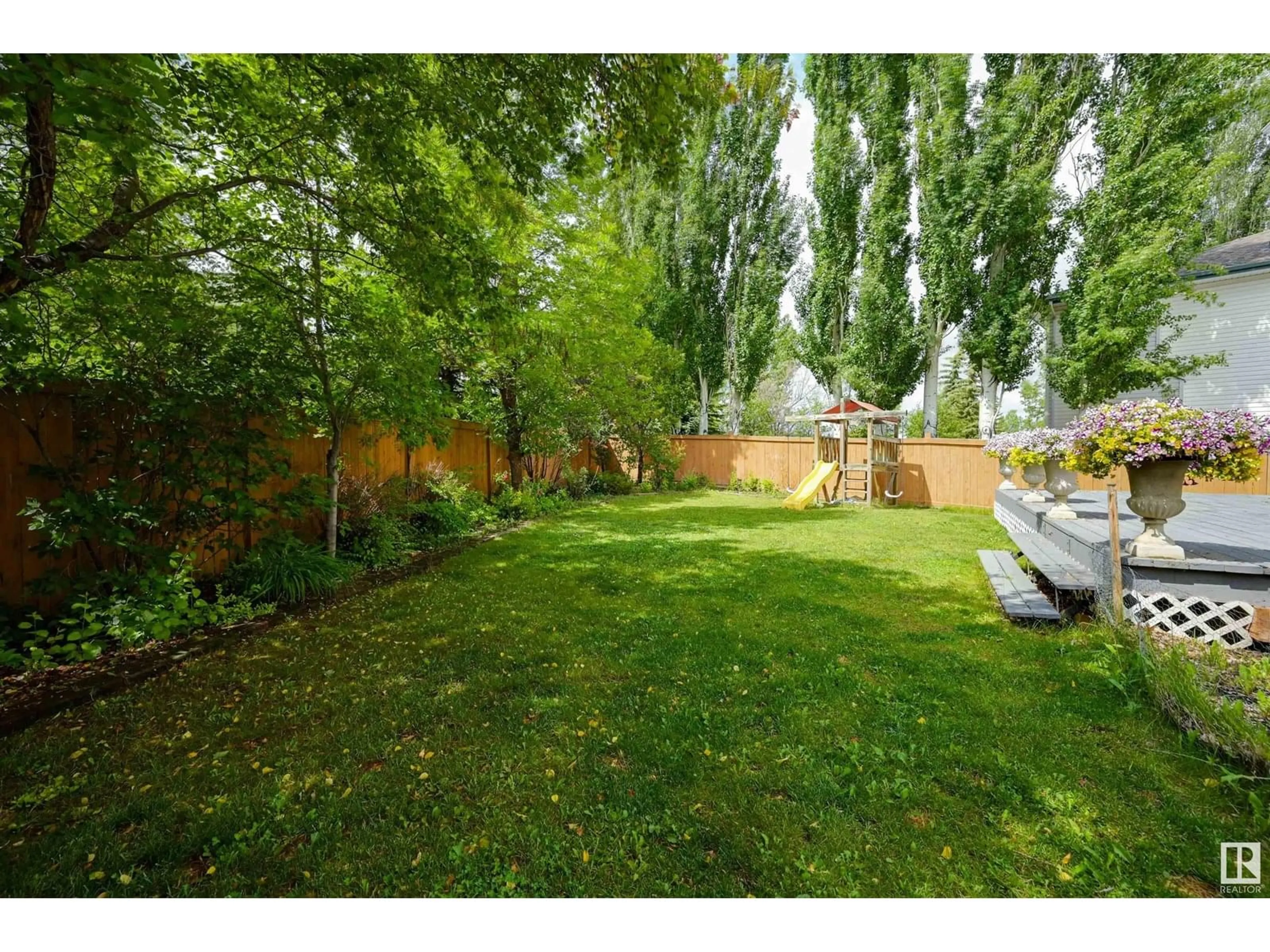 A pic from outside/outdoor area/front of a property/back of a property/a pic from drone, forest/trees view for 108 DECHENE RD, Edmonton Alberta T6M2M9