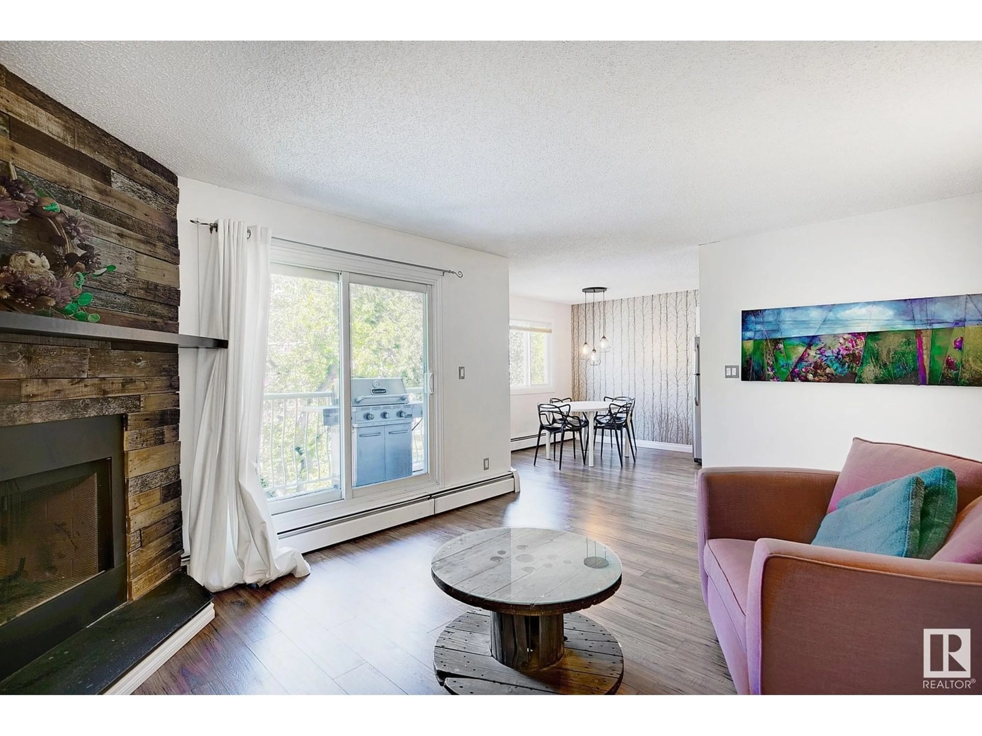 Living room with furniture, wood/laminate floor for #302 - 11330 108 AV, Edmonton Alberta T5H1B6