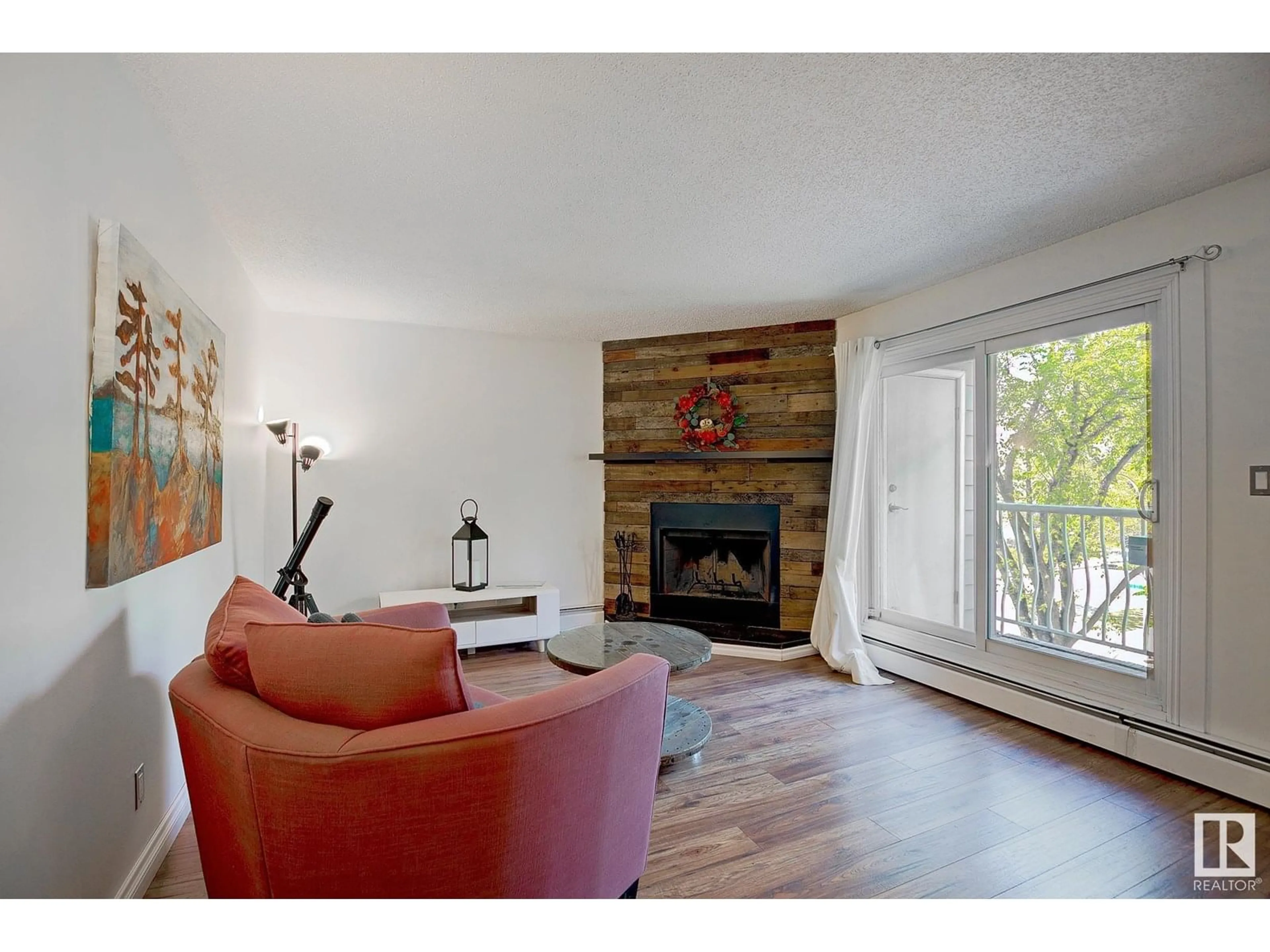 Living room with furniture, wood/laminate floor for #302 - 11330 108 AV, Edmonton Alberta T5H1B6