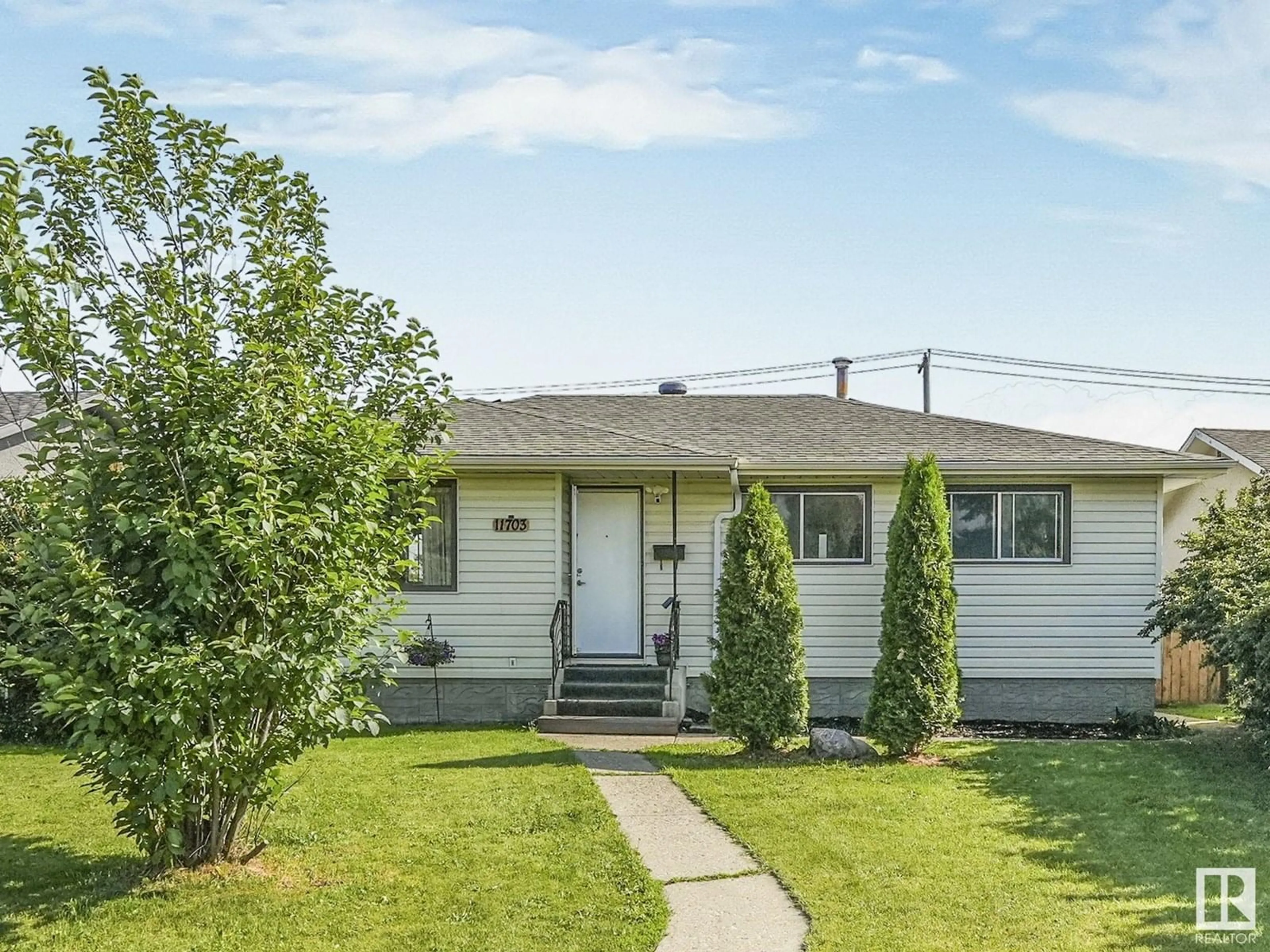 Home with vinyl exterior material, street for 11703 46 AV, Edmonton Alberta T6H0A6