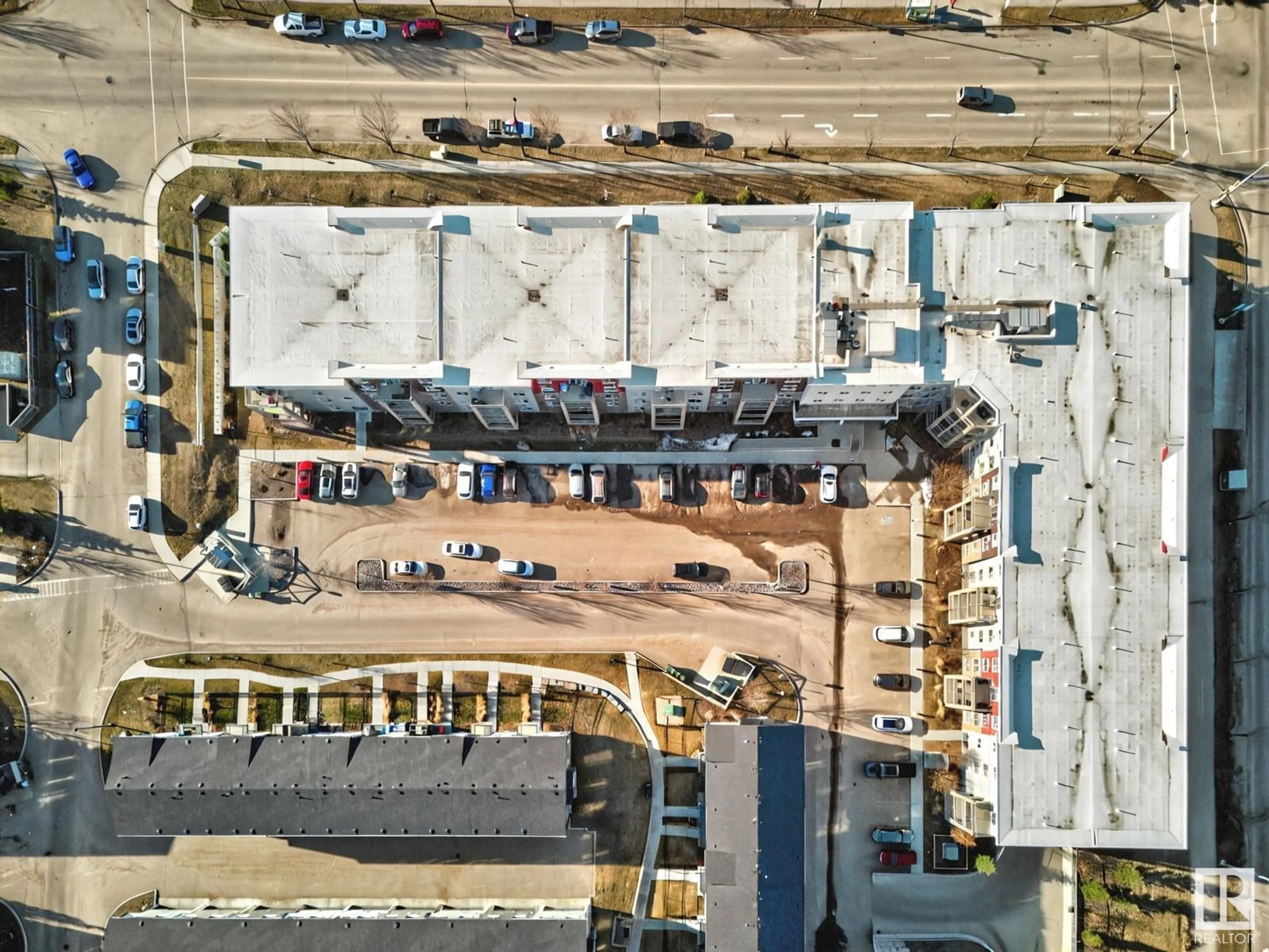 A pic from outside/outdoor area/front of a property/back of a property/a pic from drone, street for 404 - 812 WELSH DR, Edmonton Alberta T6X1Y7