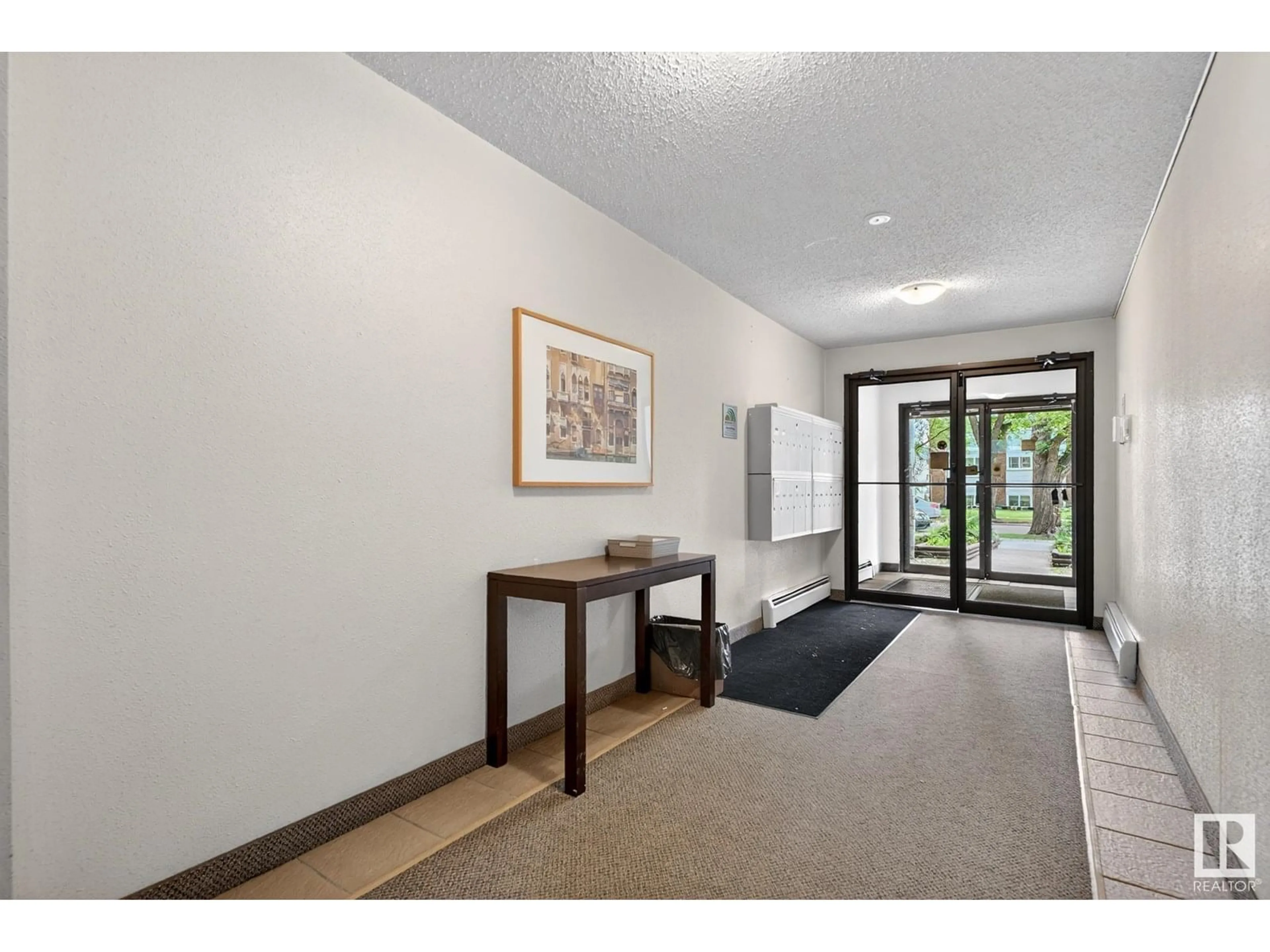 Indoor foyer for #208 - 10826 113 ST NW, Edmonton Alberta T5H3J2