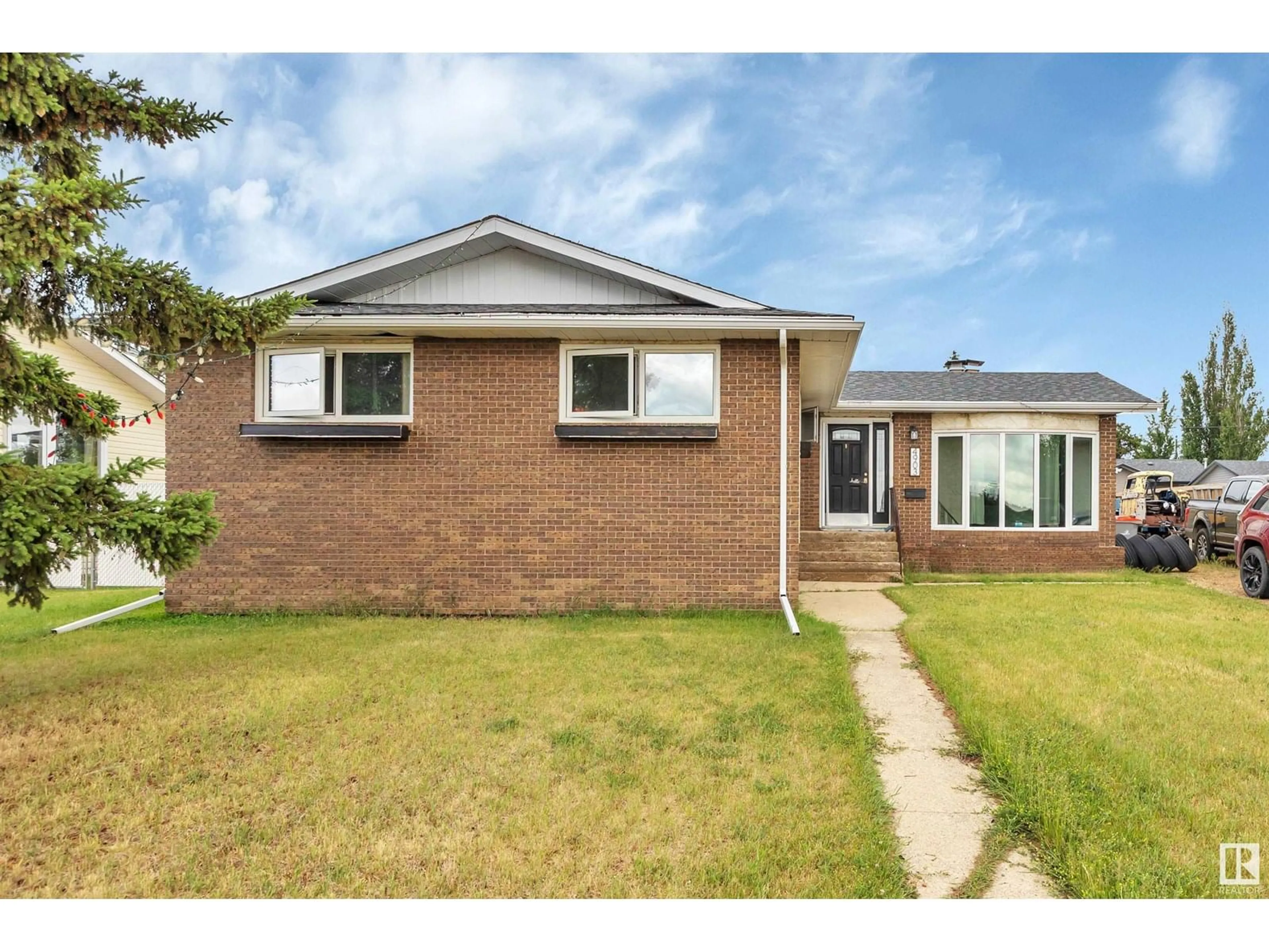 Home with brick exterior material, street for 4903 52 ST, Millet Alberta T0C1Z0
