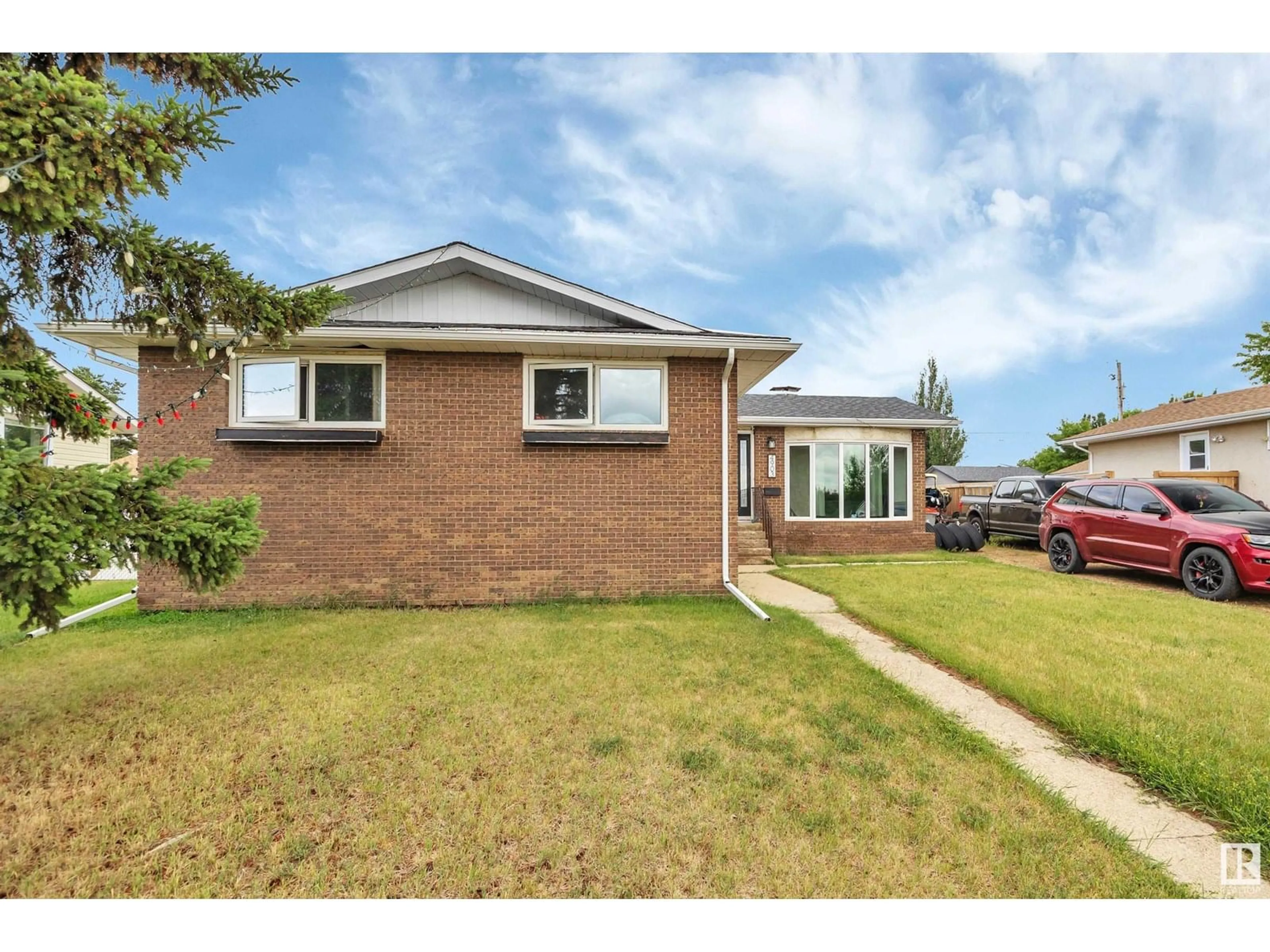 Home with brick exterior material, street for 4903 52 ST, Millet Alberta T0C1Z0