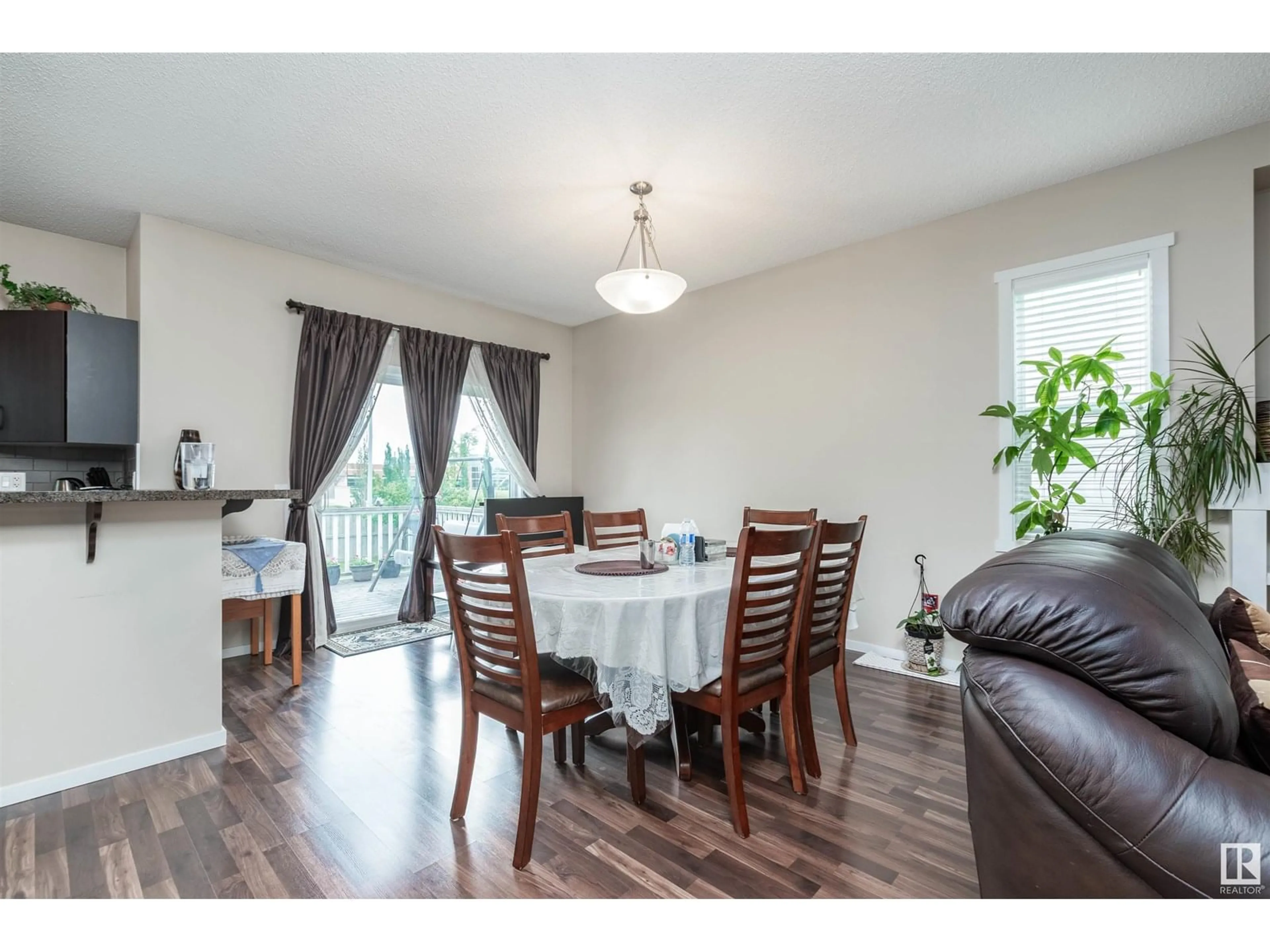 Dining room, wood/laminate floor for 7526 ELLESMERE WY, Sherwood Park Alberta T8H0P6