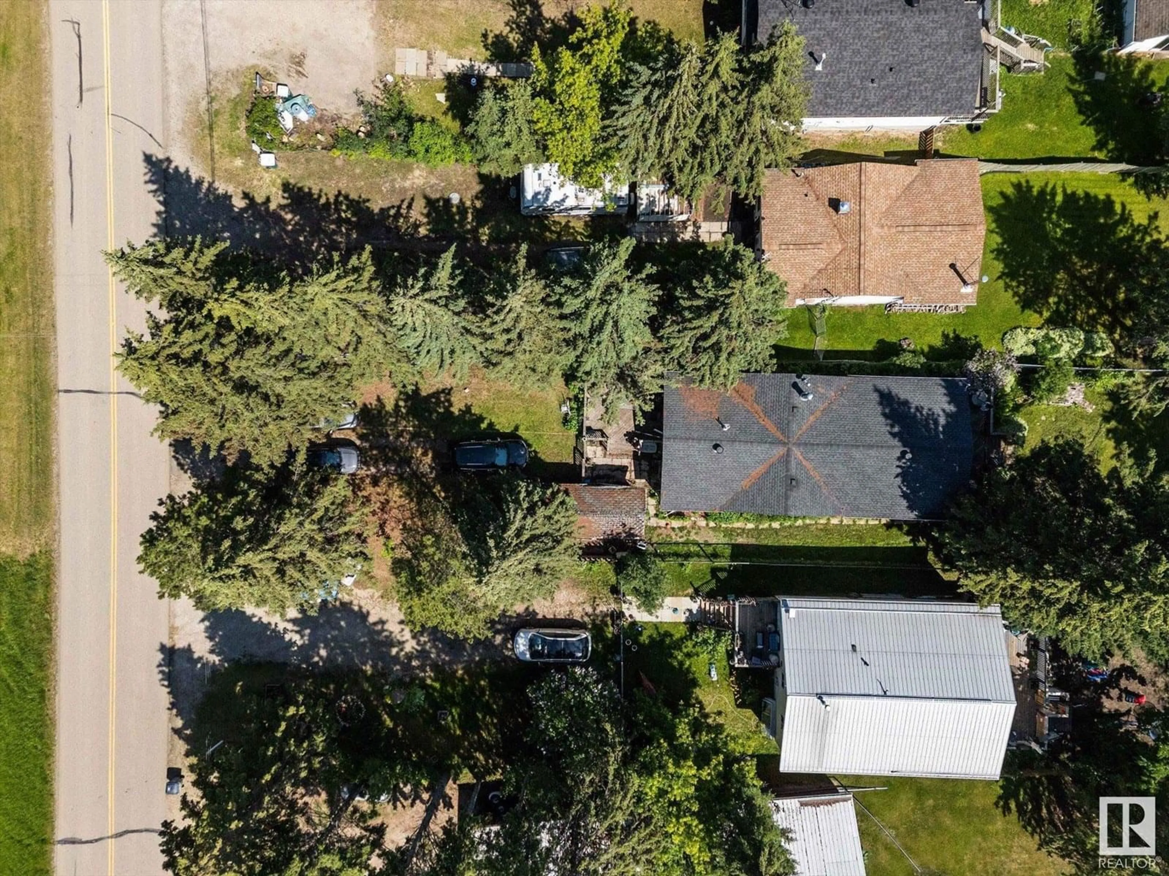 A pic from outside/outdoor area/front of a property/back of a property/a pic from drone, street for 257 RGE RD 20, Rural Parkland County Alberta T7Z2V2