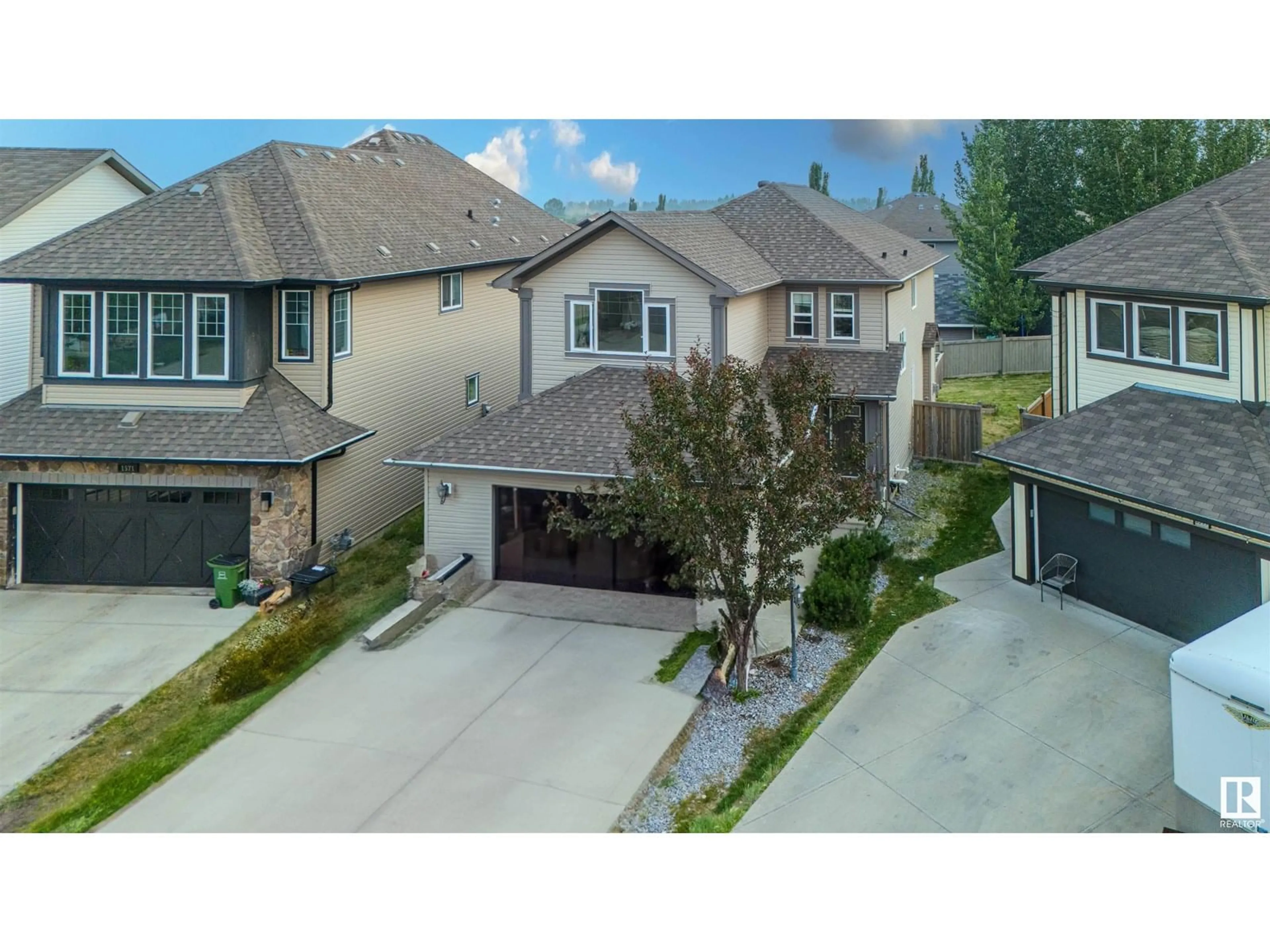 A pic from outside/outdoor area/front of a property/back of a property/a pic from drone, street for 1575 36 AV, Edmonton Alberta T6T0M5