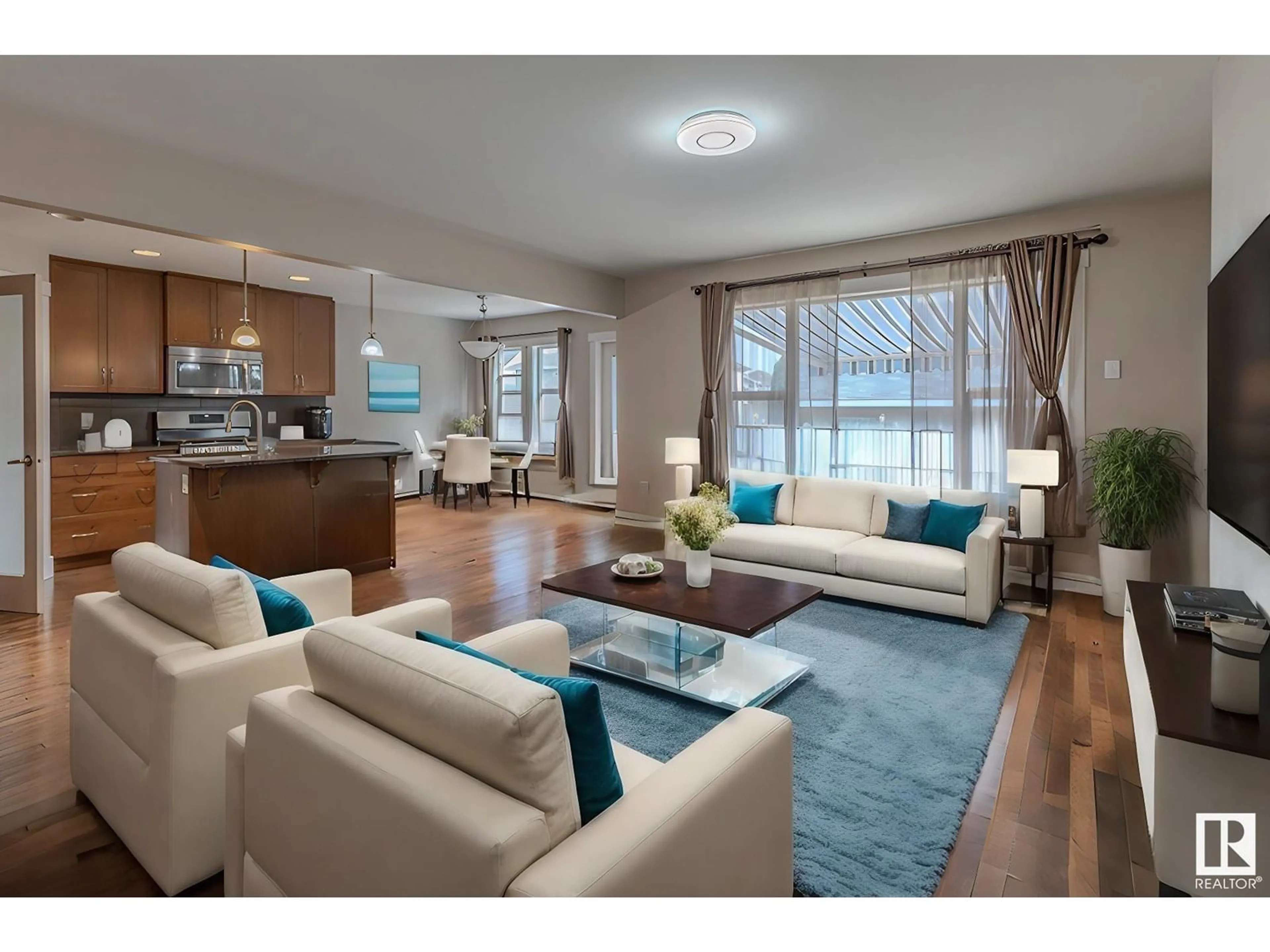 Living room with furniture, wood/laminate floor for 1575 36 AV, Edmonton Alberta T6T0M5